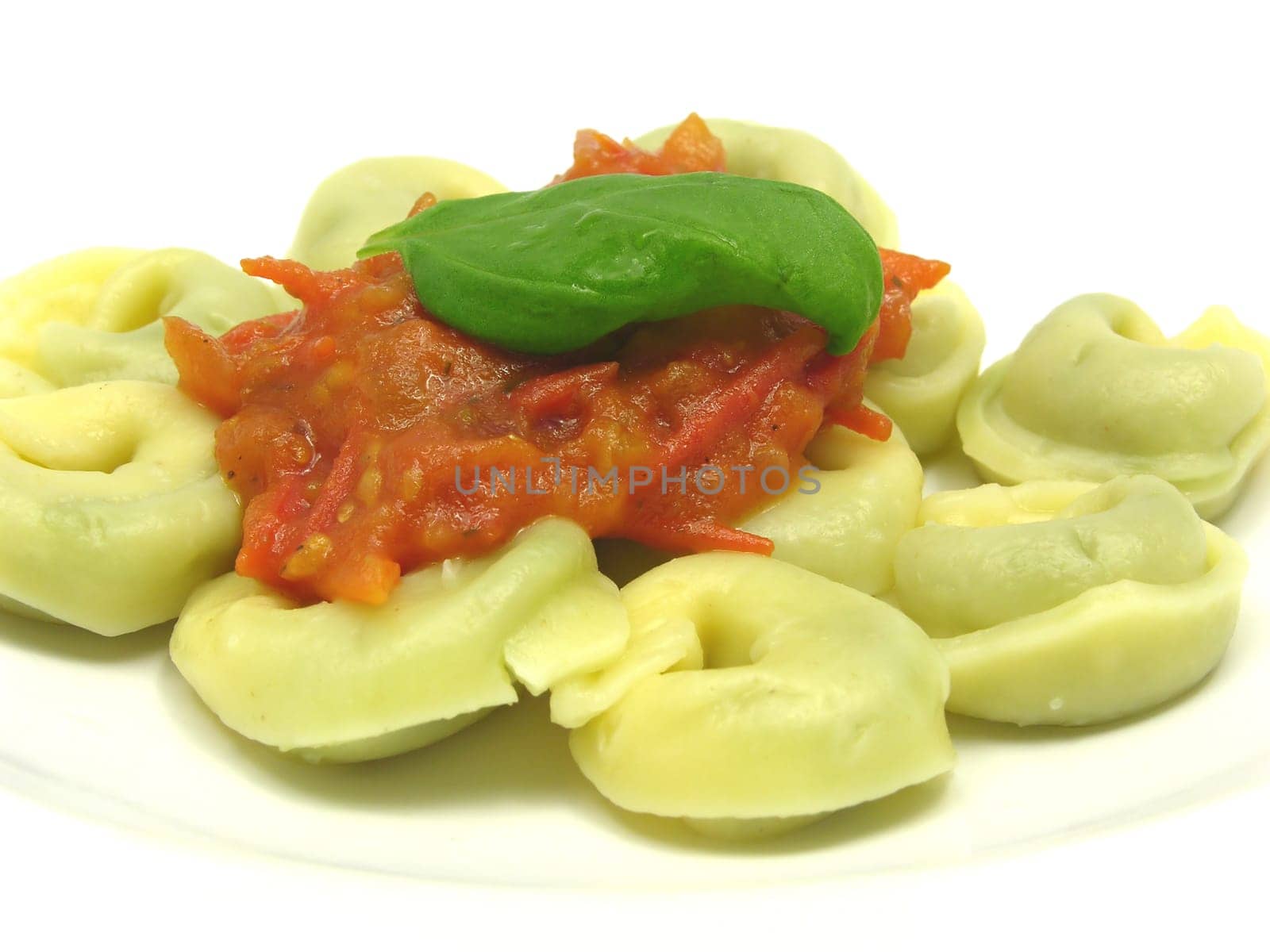 Stuffed noodles as a close-up against a white background
