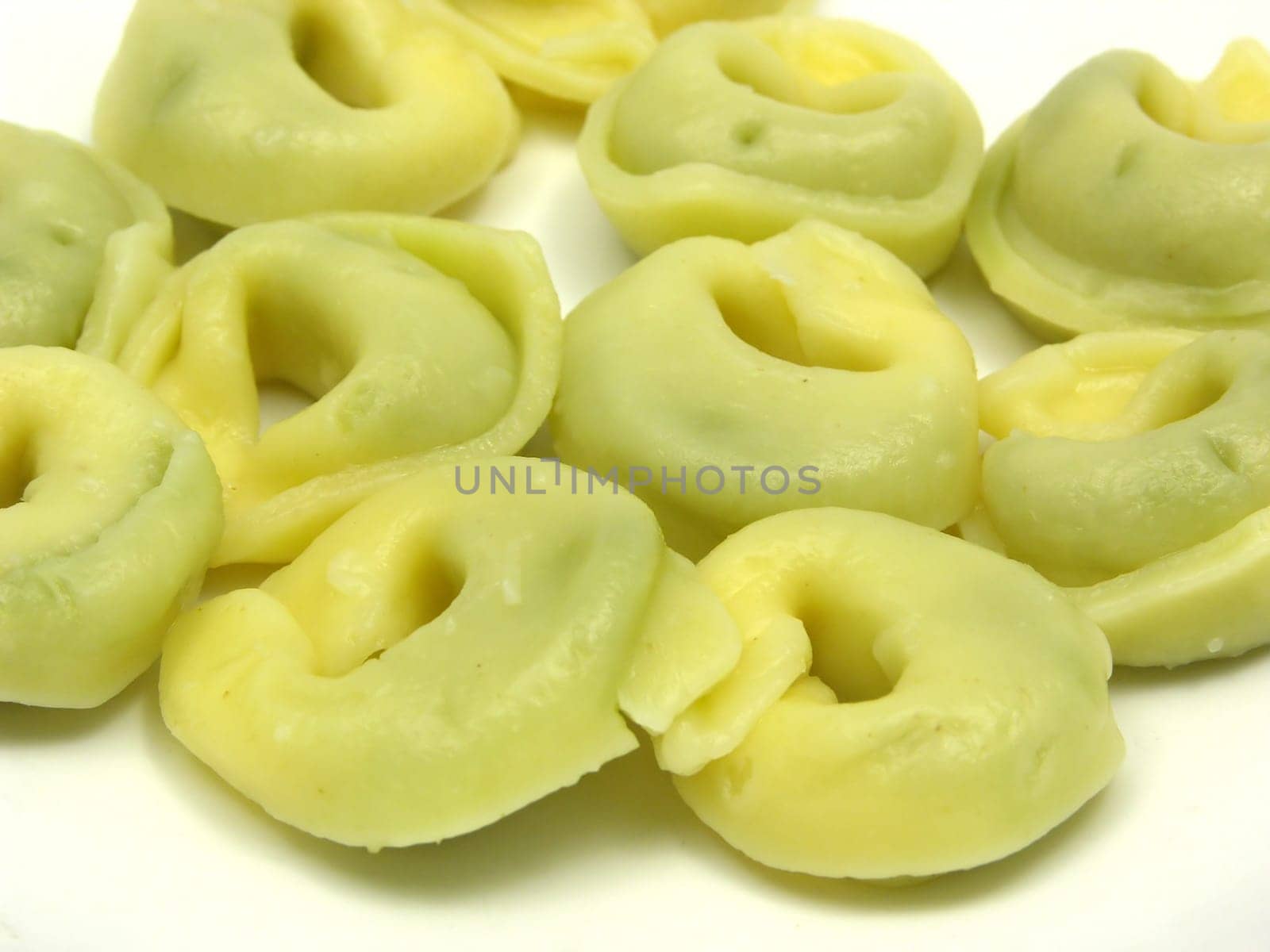 Stuffed noodles as a close-up against a white background