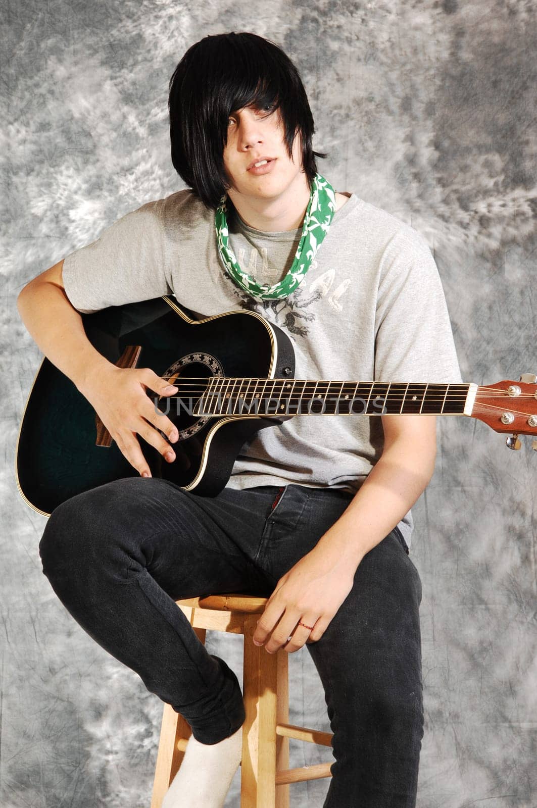 Boy with guitar.