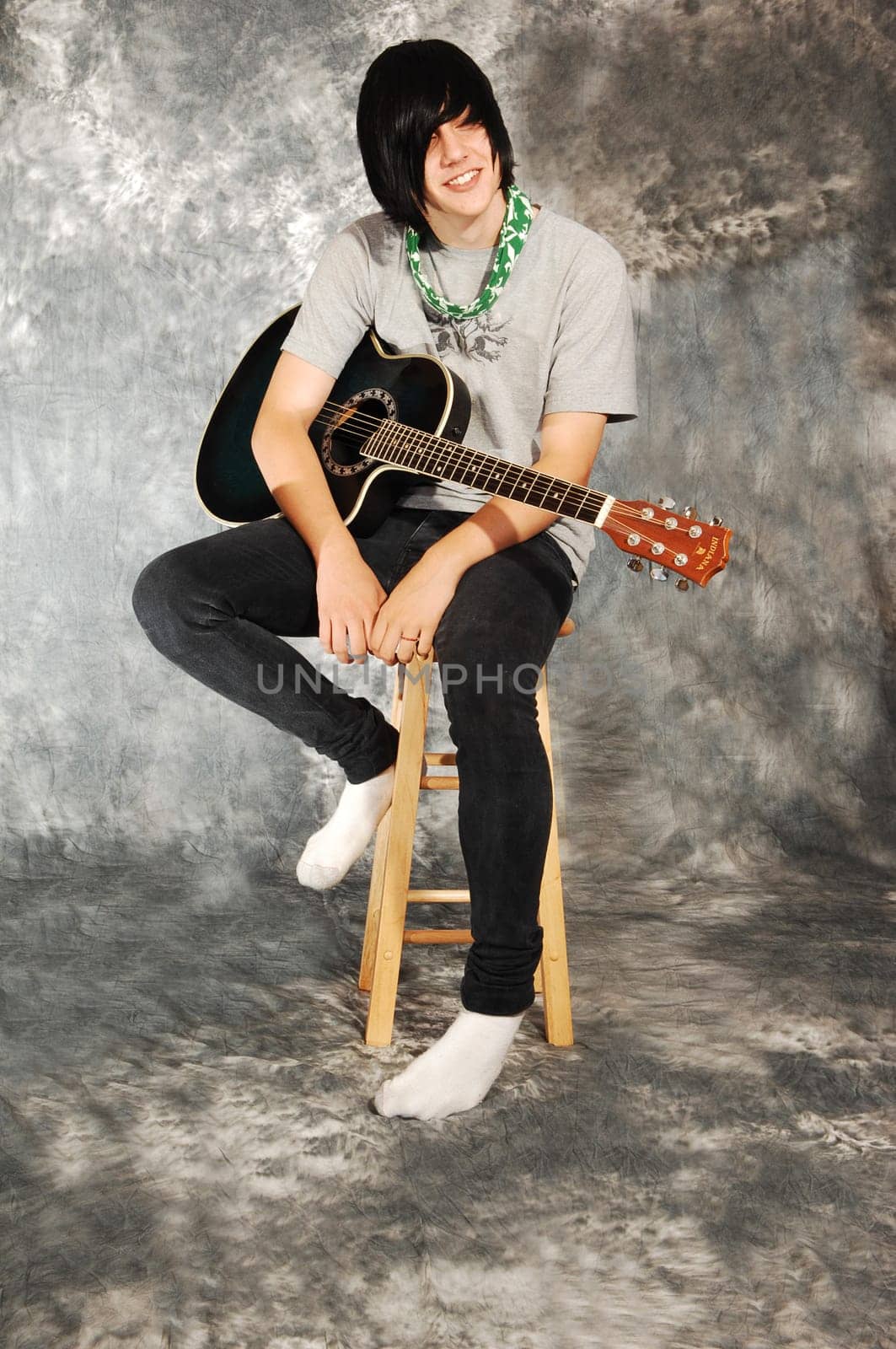 Boy with guitar.