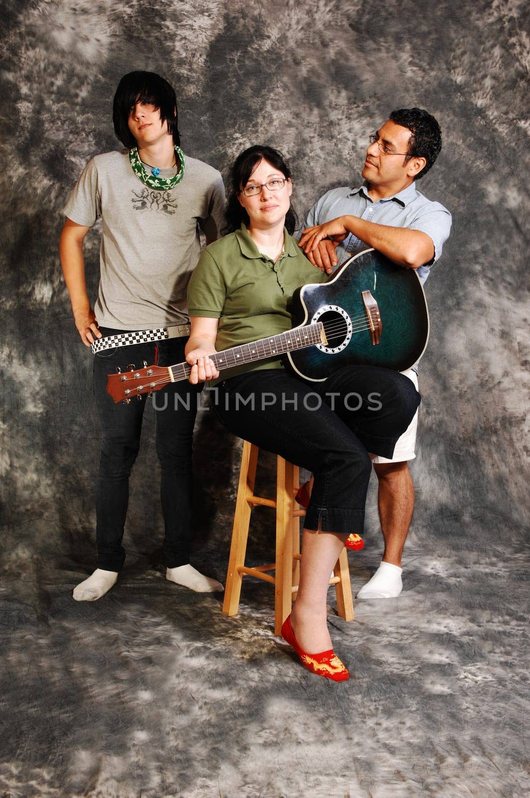 Family with guitar.