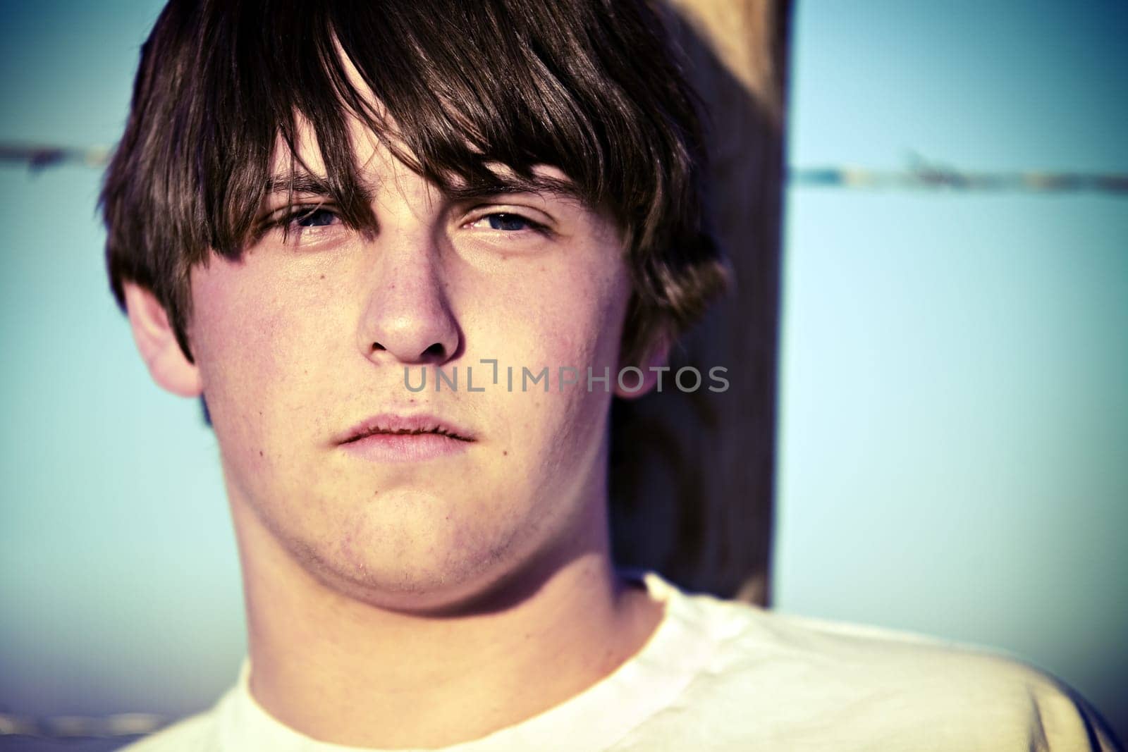 teen against fence