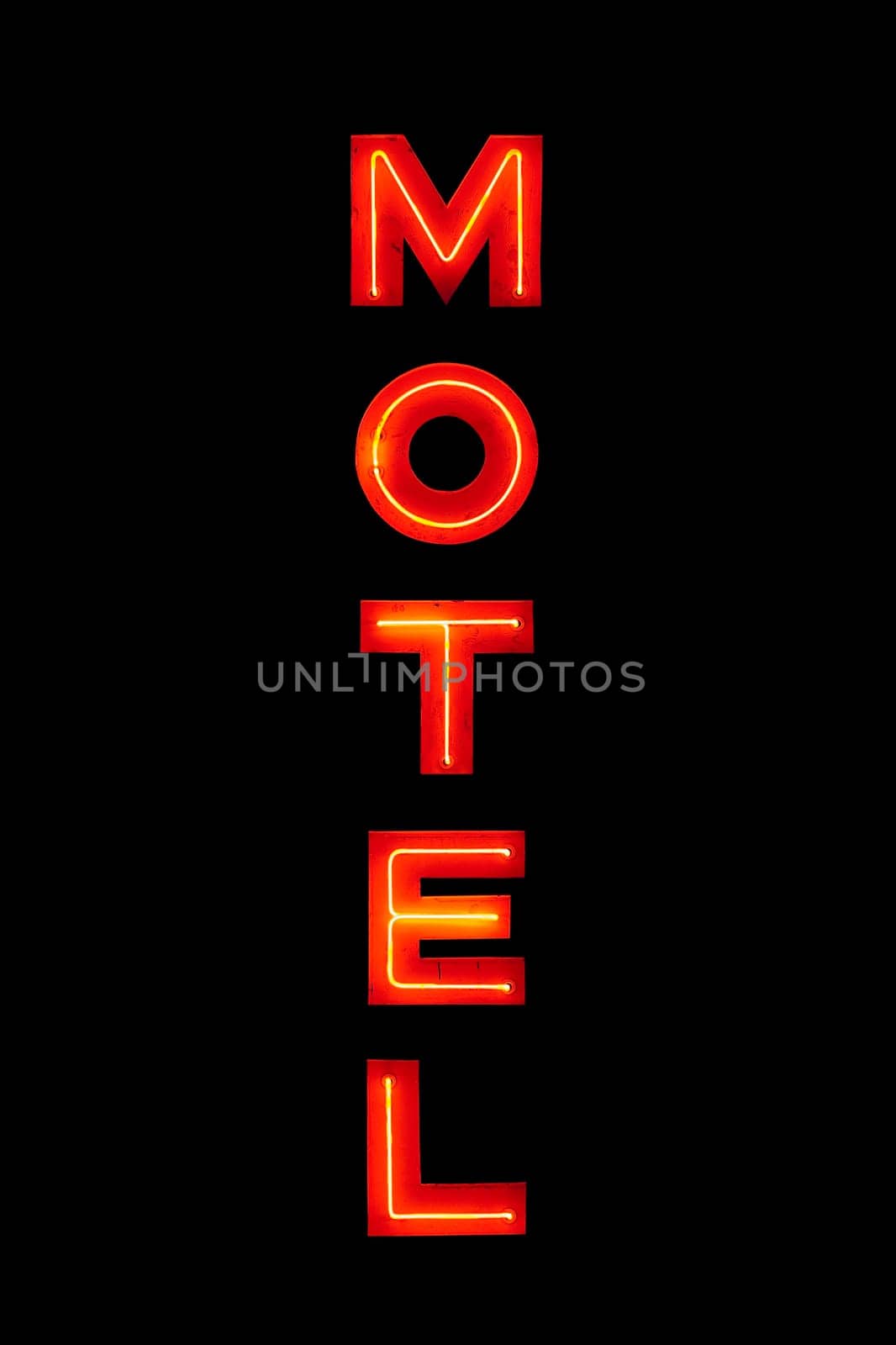 Motel neon sign isolated on black