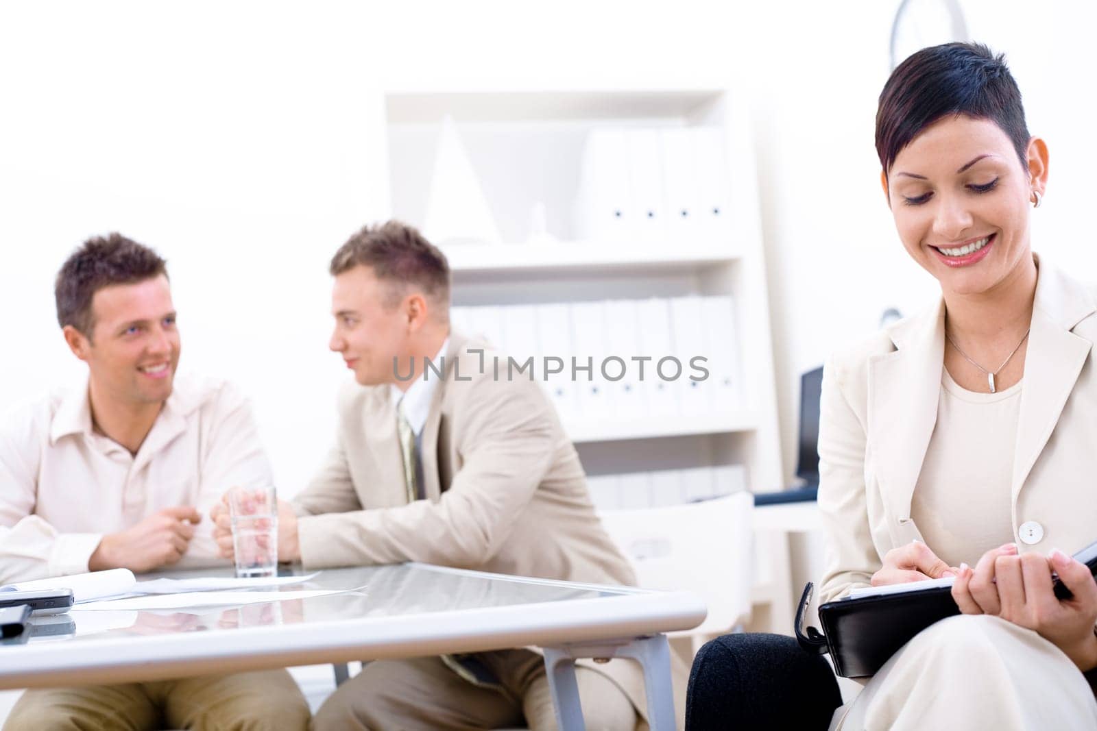 Businesswoman writing