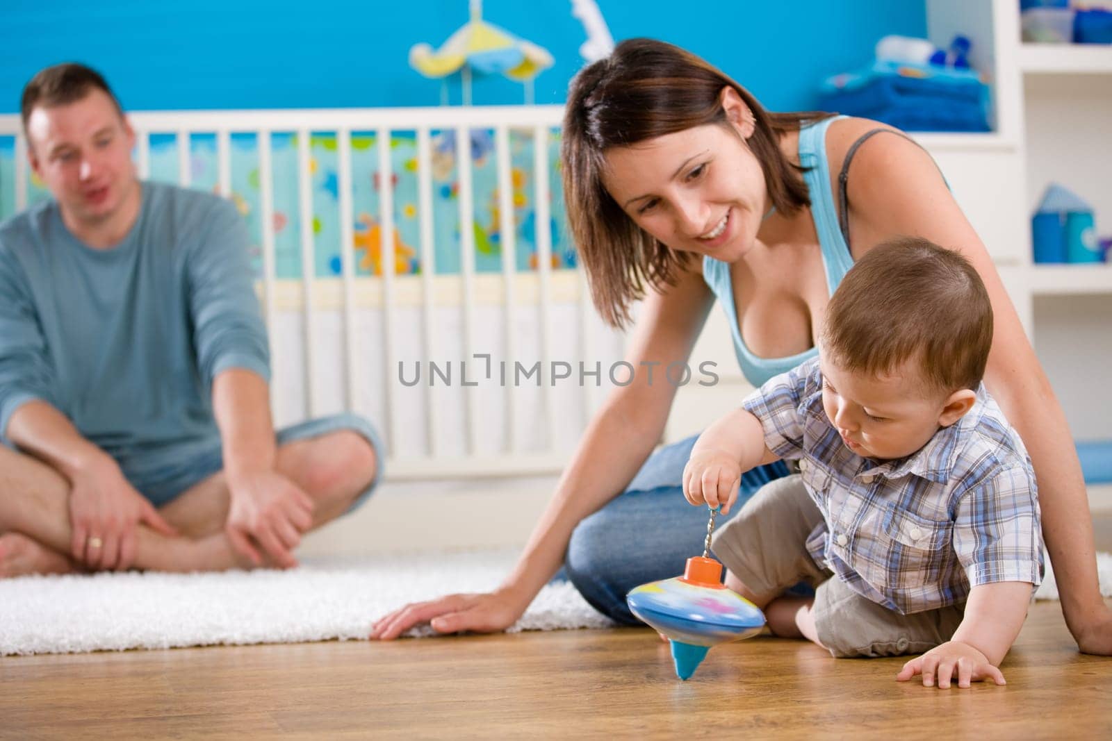 Happy family playing at home