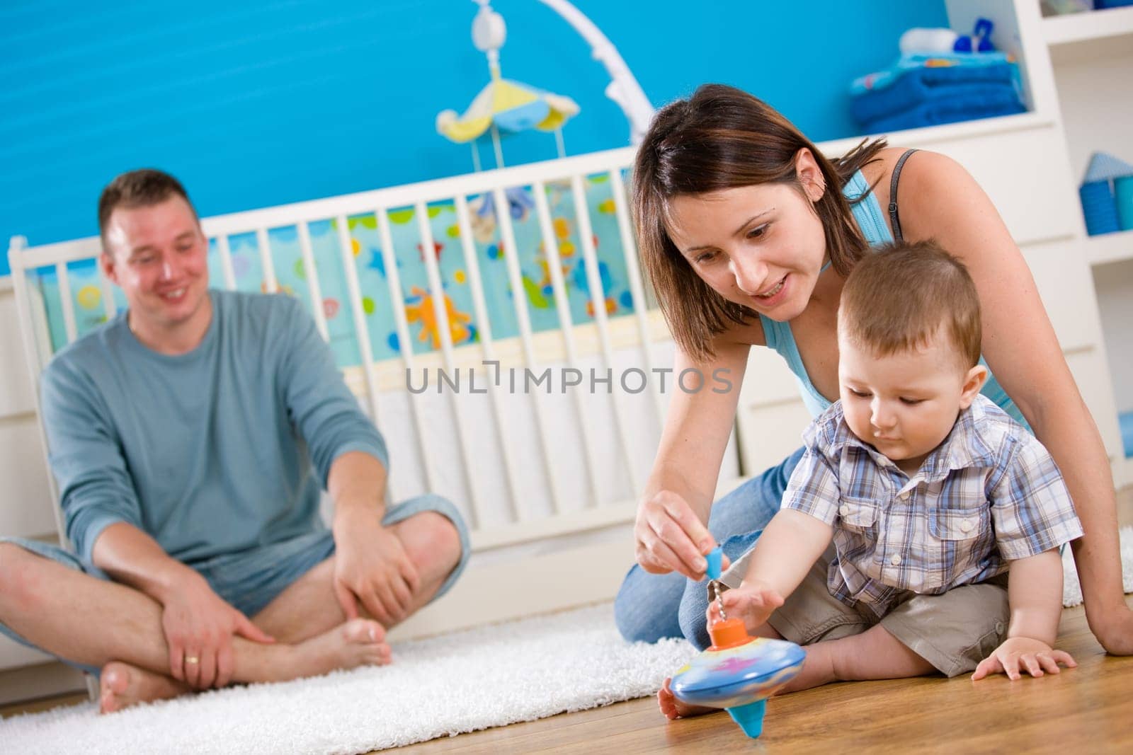 Happy family playing at home