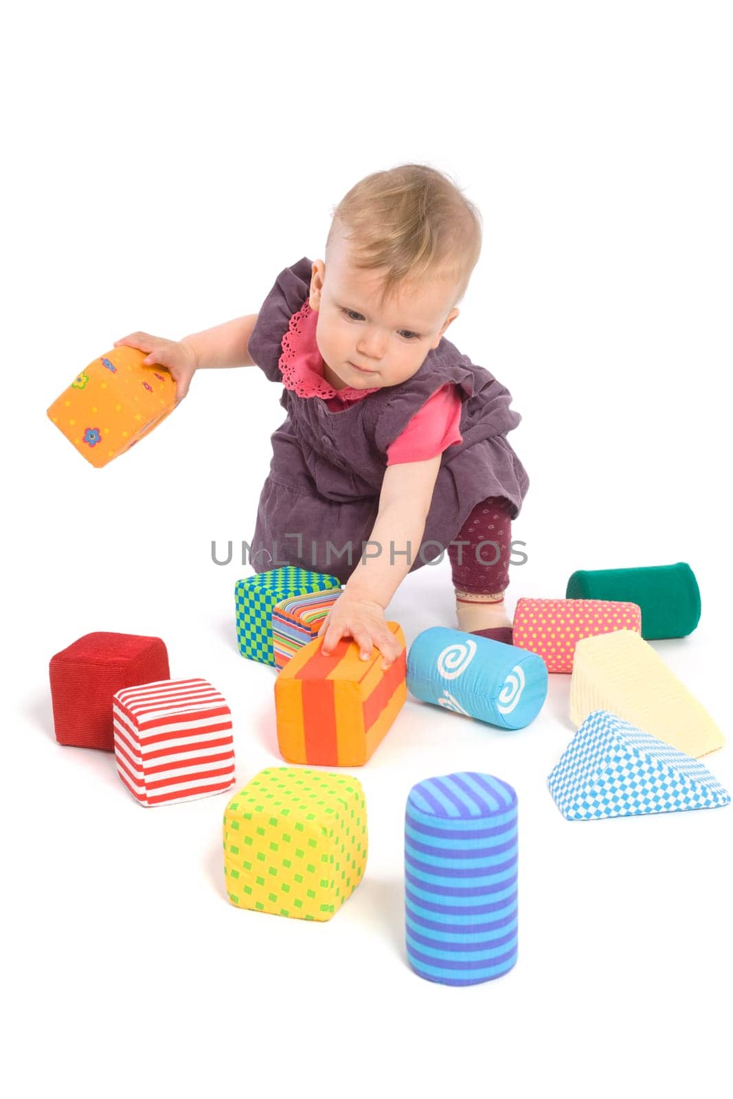 Baby palying with toy blocks