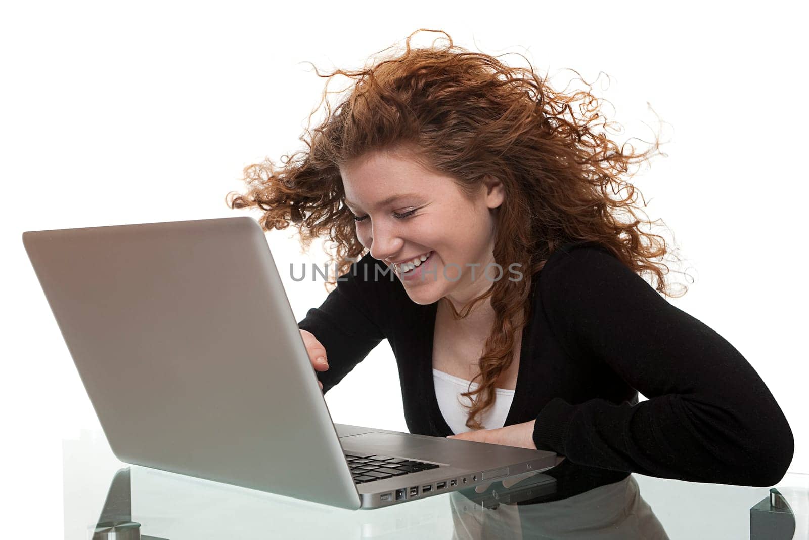 redhead teen with laptop