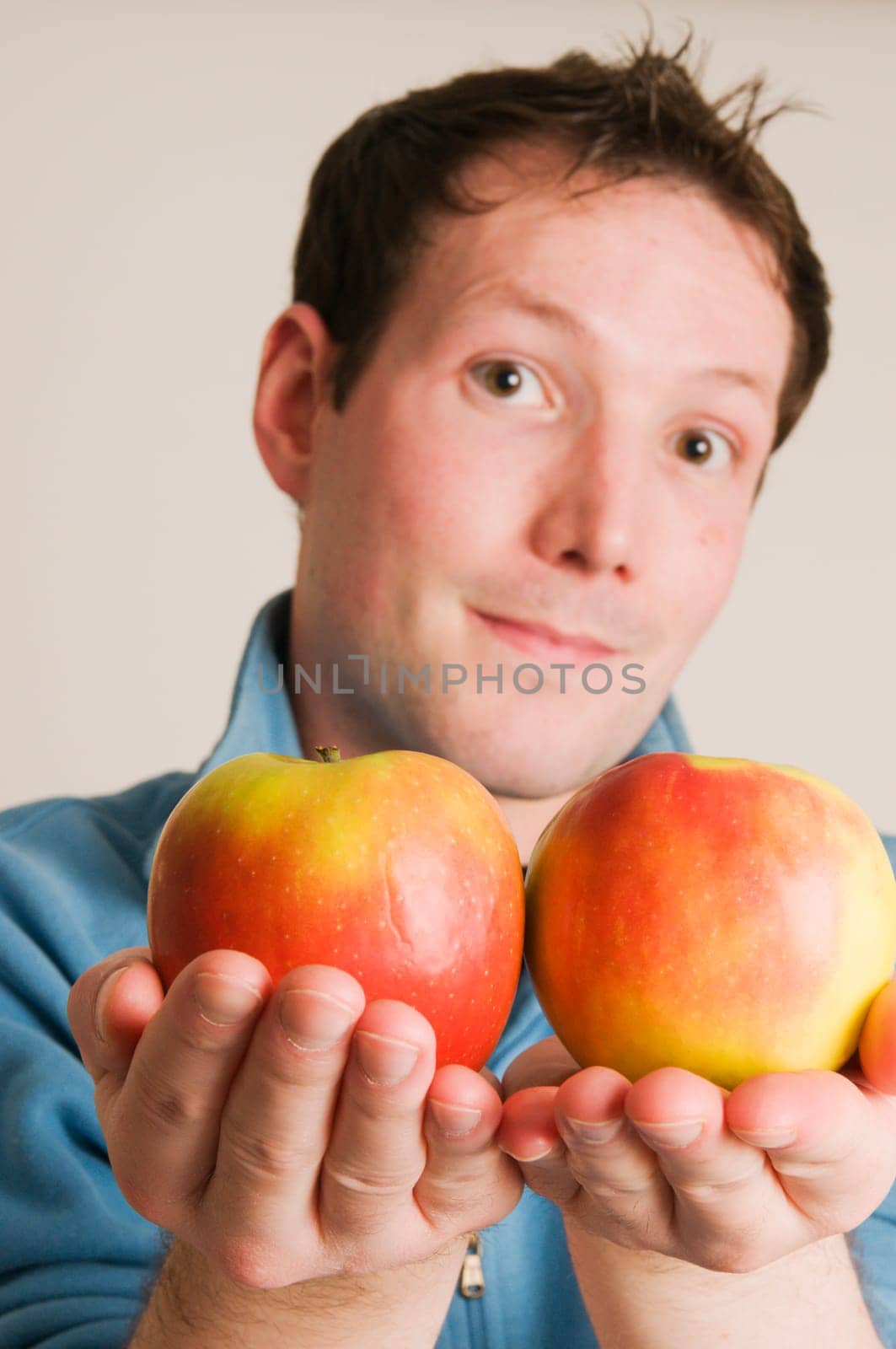 Man Offer Two Apples