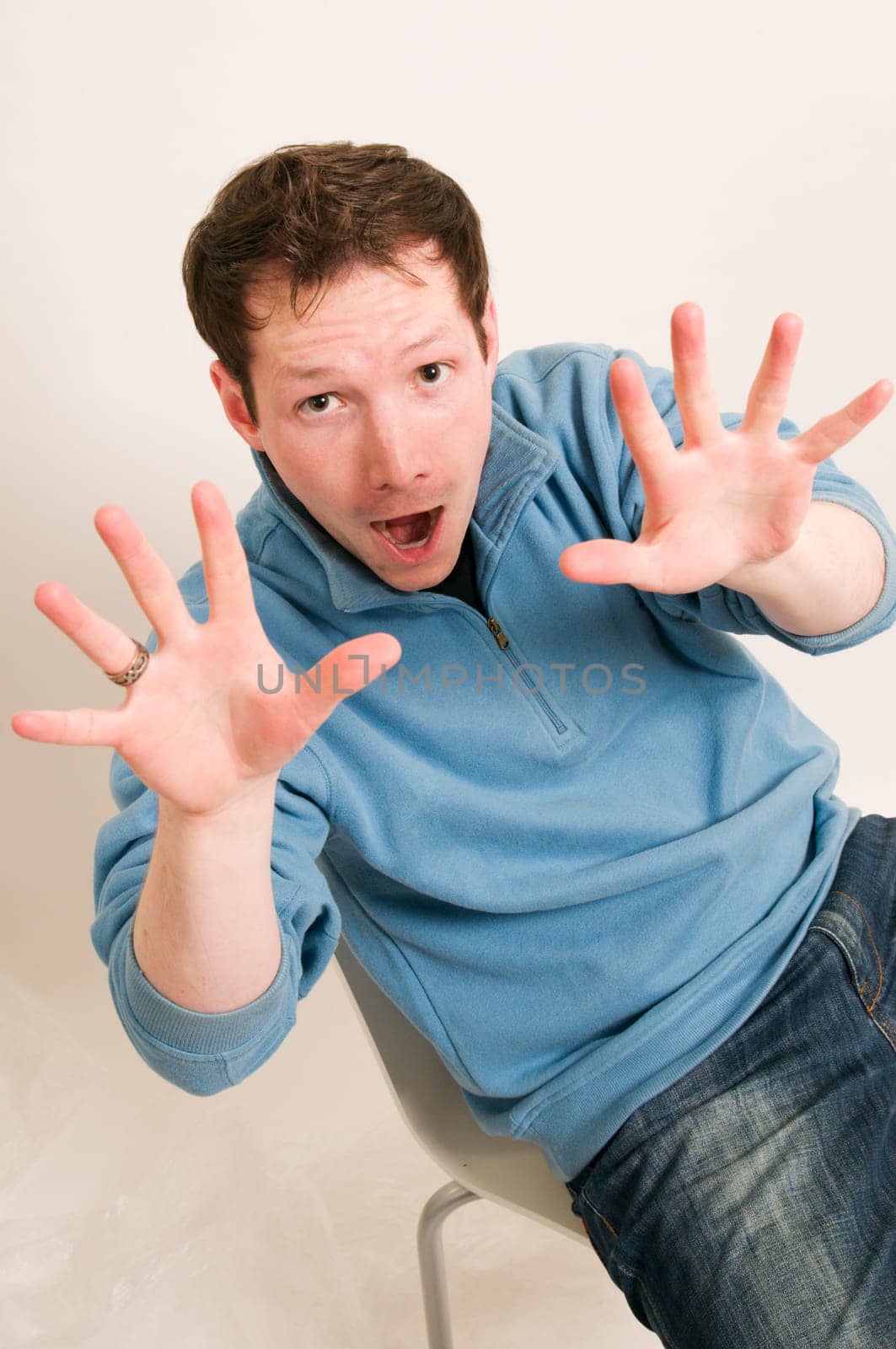 man frighten gesture