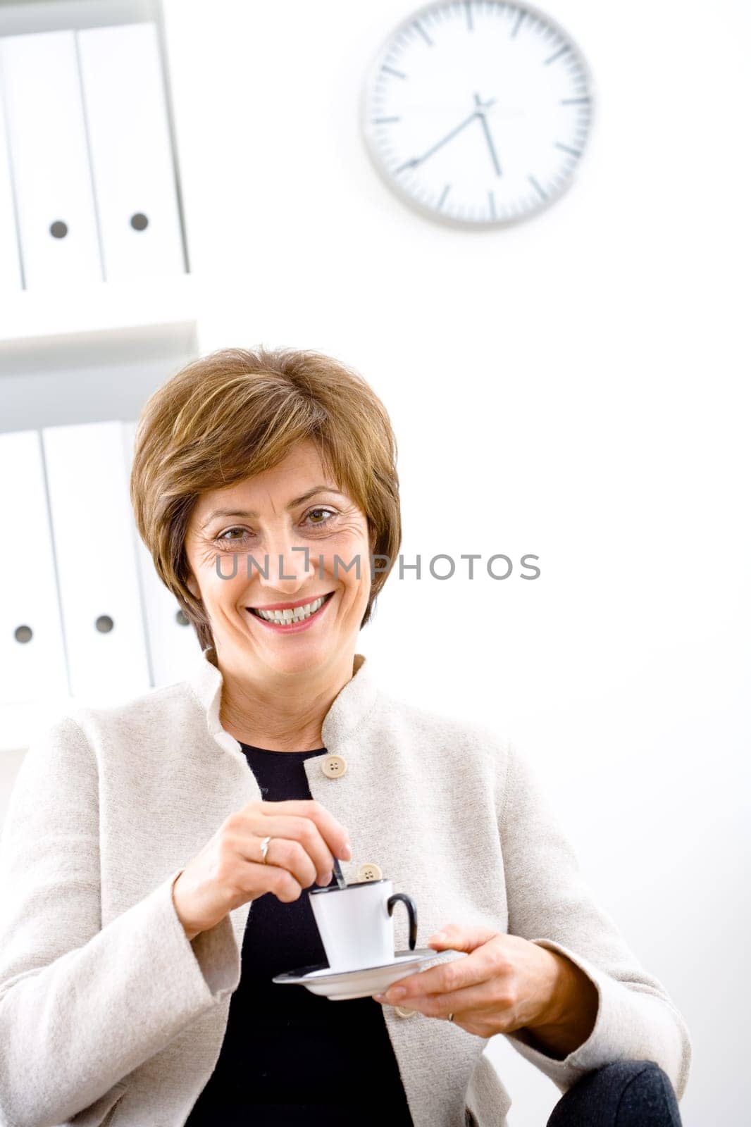 Businesswoman having coffee break