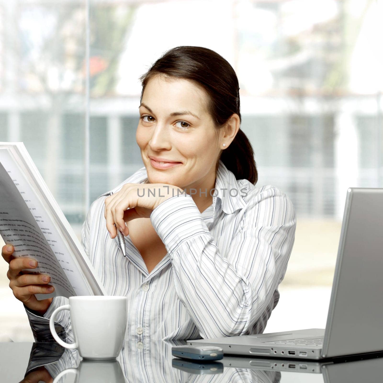 Businesswoman reads document