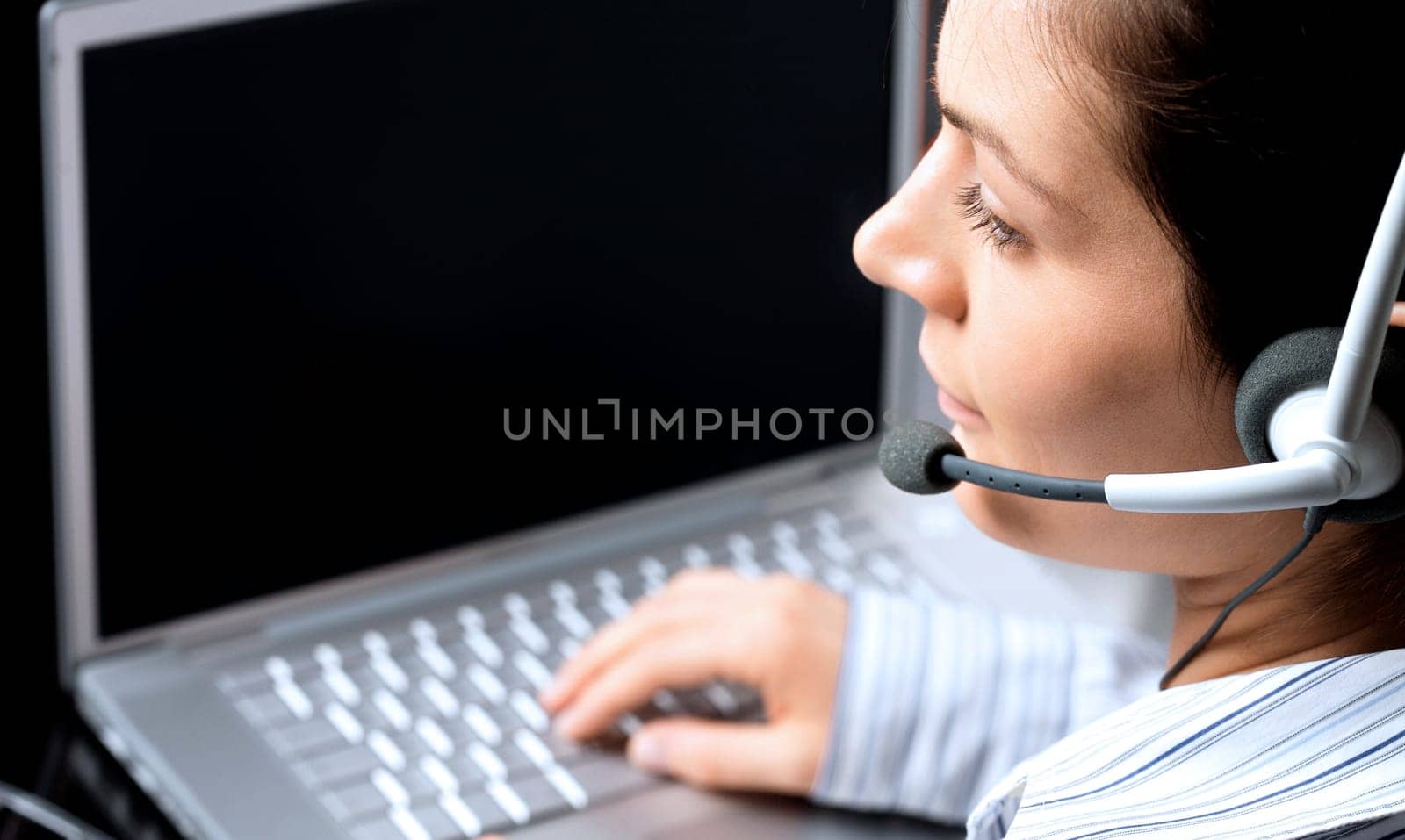 Operator works on laptop