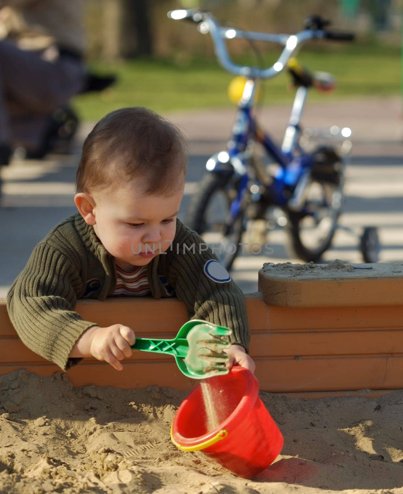 playing in sand pit