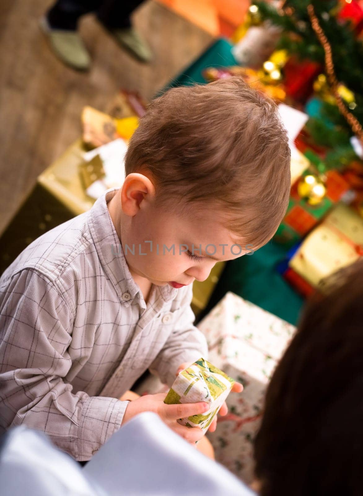Kid and Christmas present