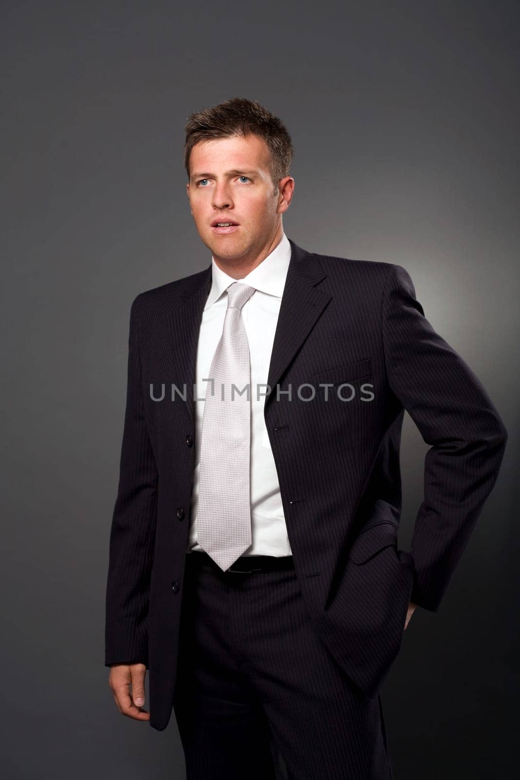 Businessman with hand in pocket