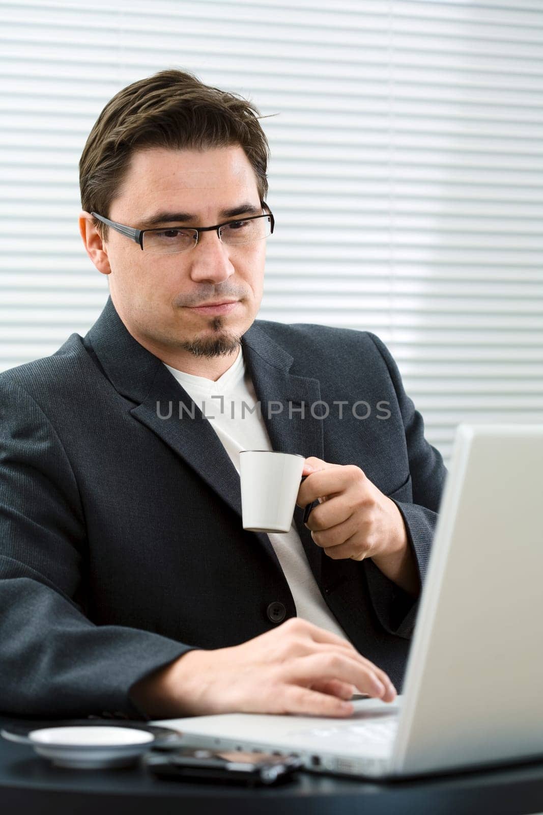 Businessman drinking coffee