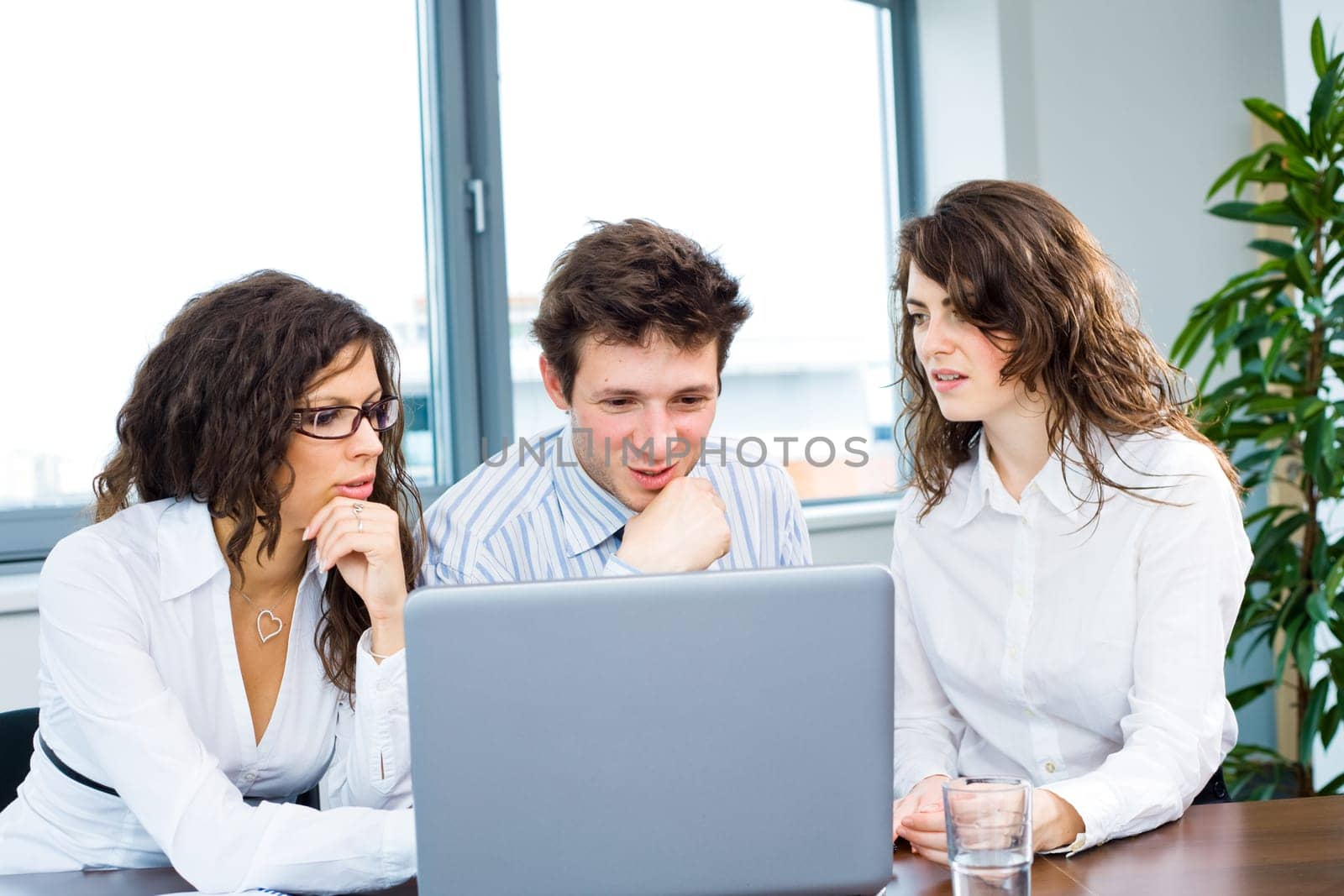 Businessteam working on laptop