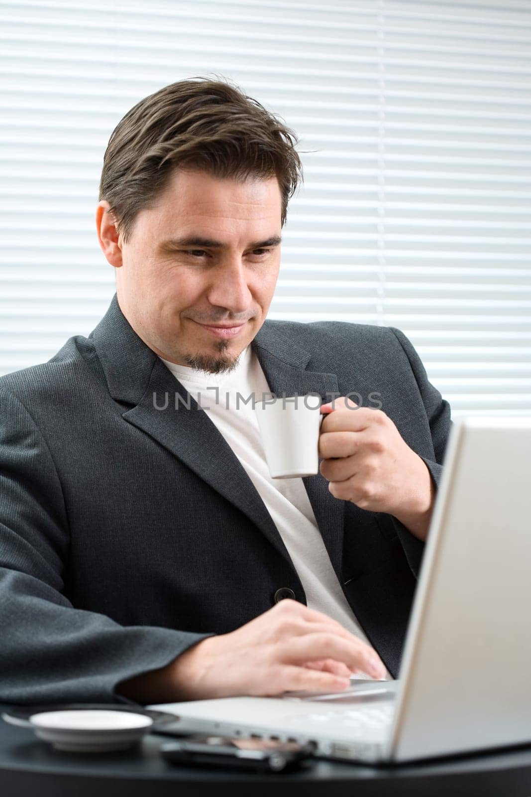 Businessman drinking coffee
