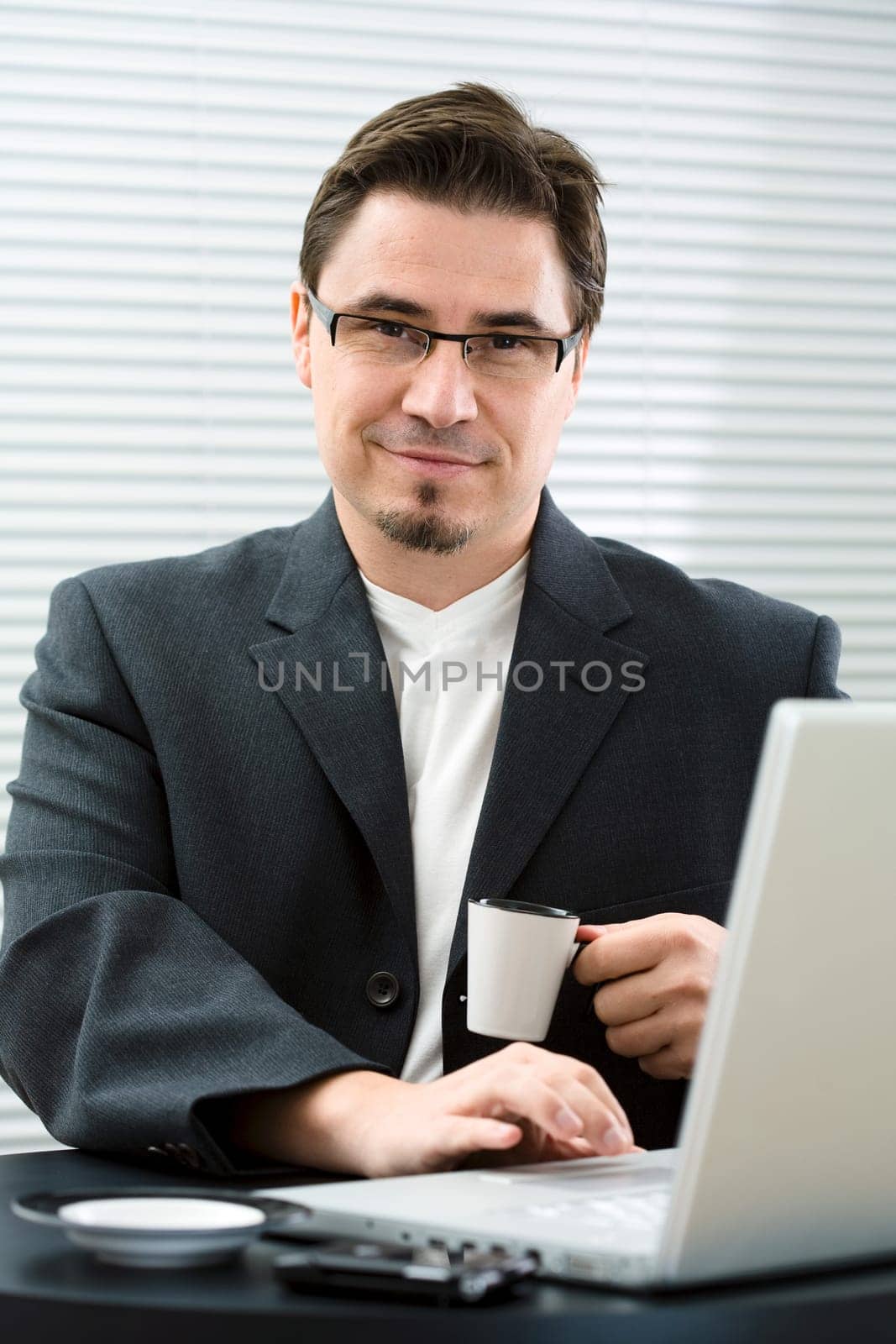 Businessman drinking coffee