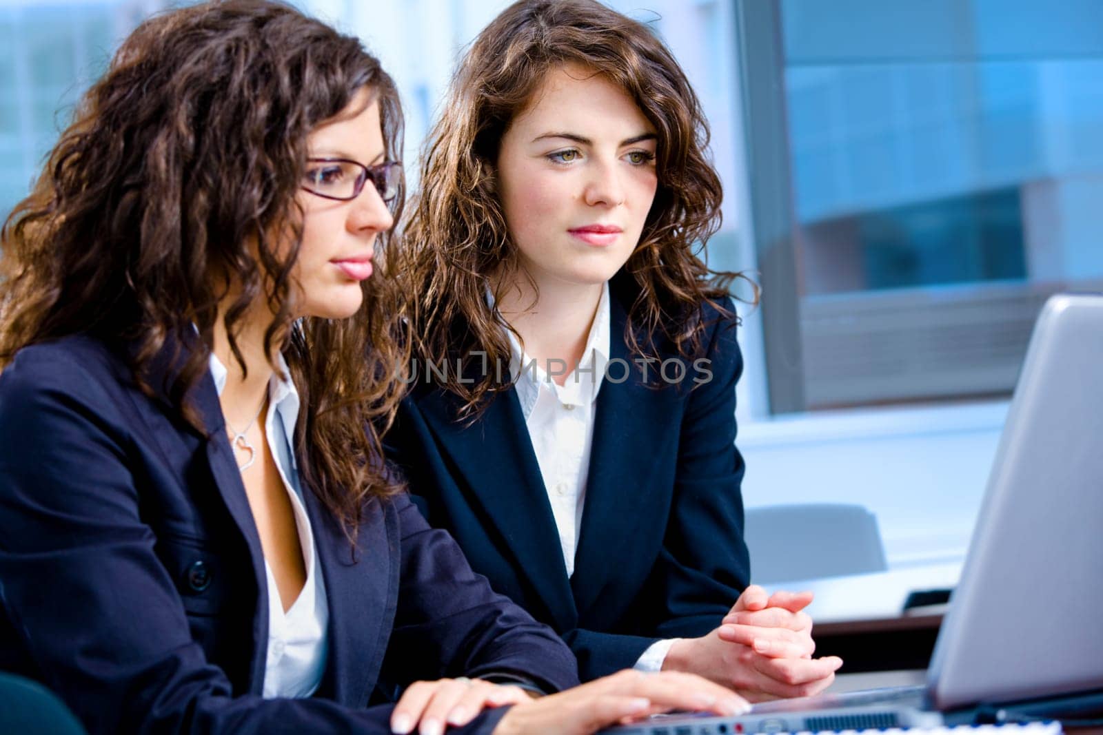 Businesswomen working on computer