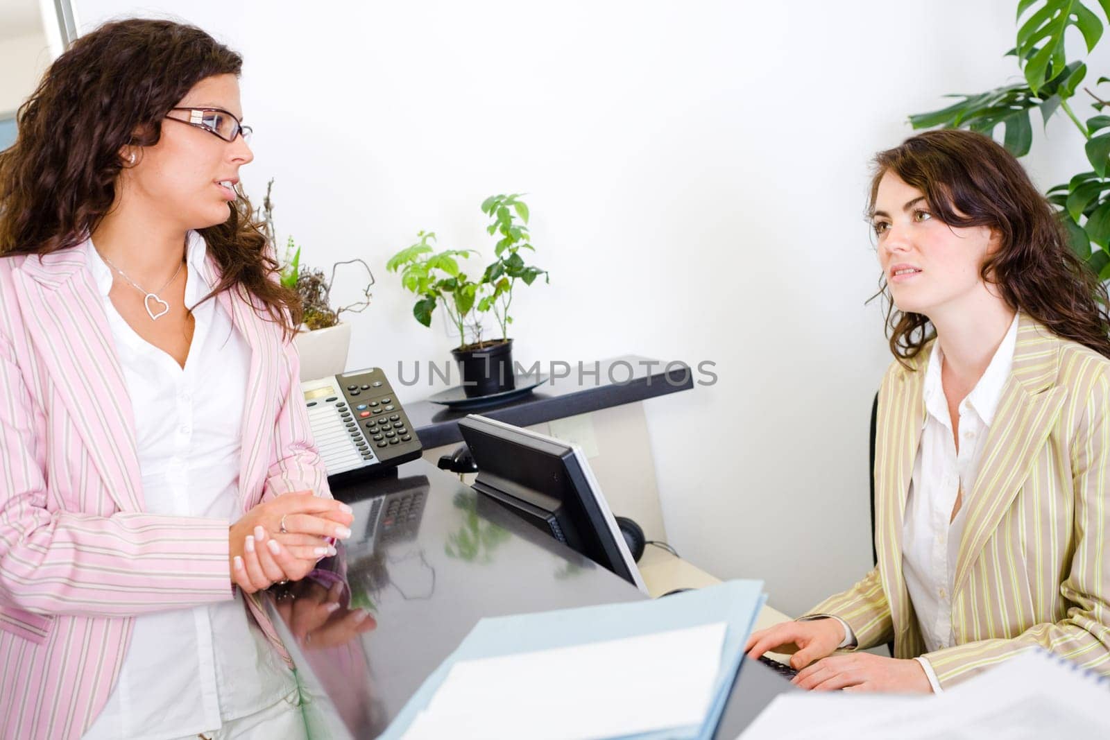 Office workers talking