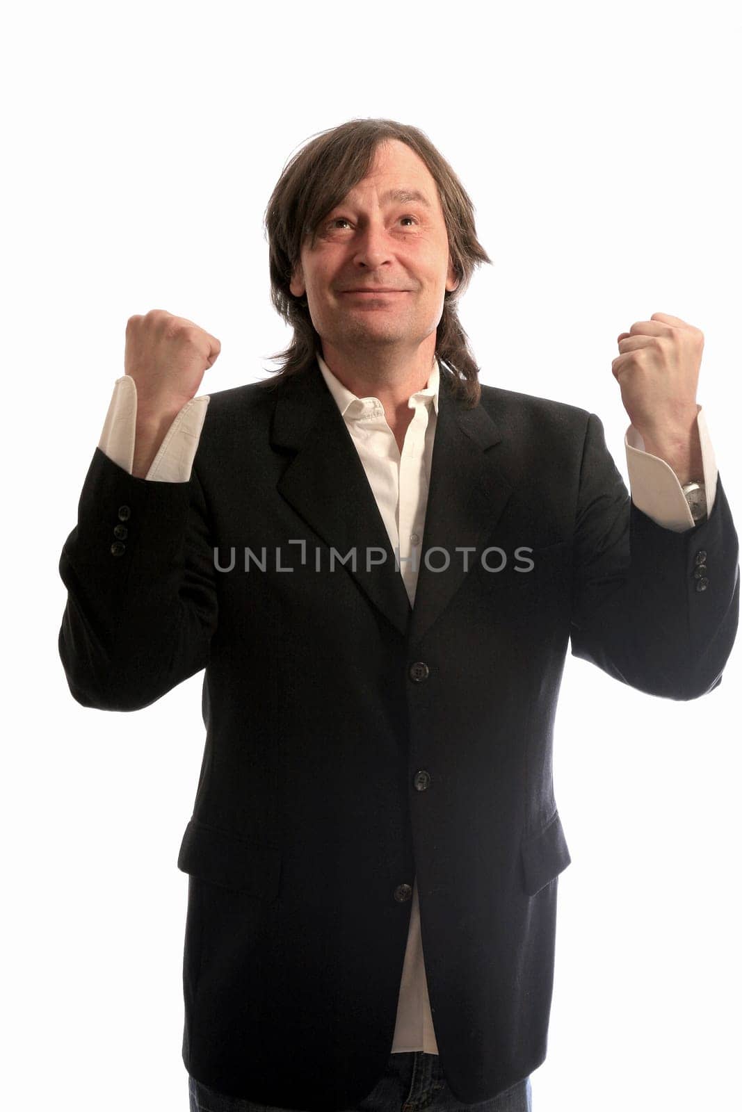 Businessman rejoices and cheers