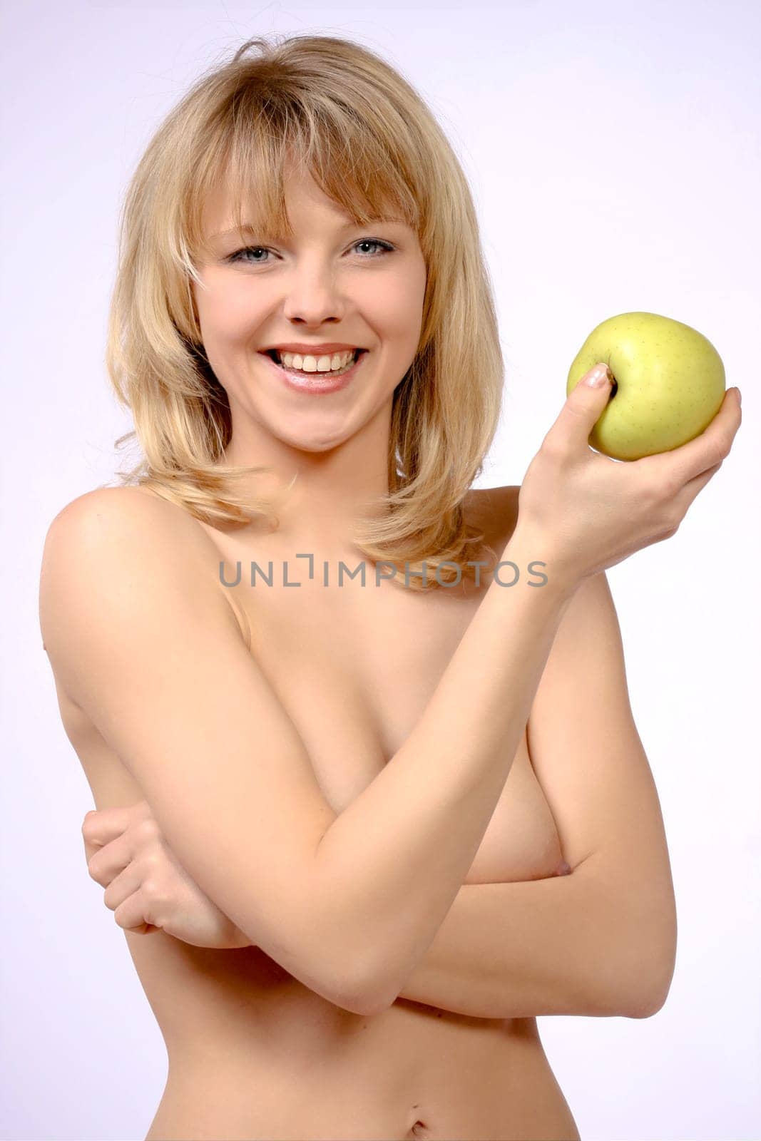 smiling woman with apple