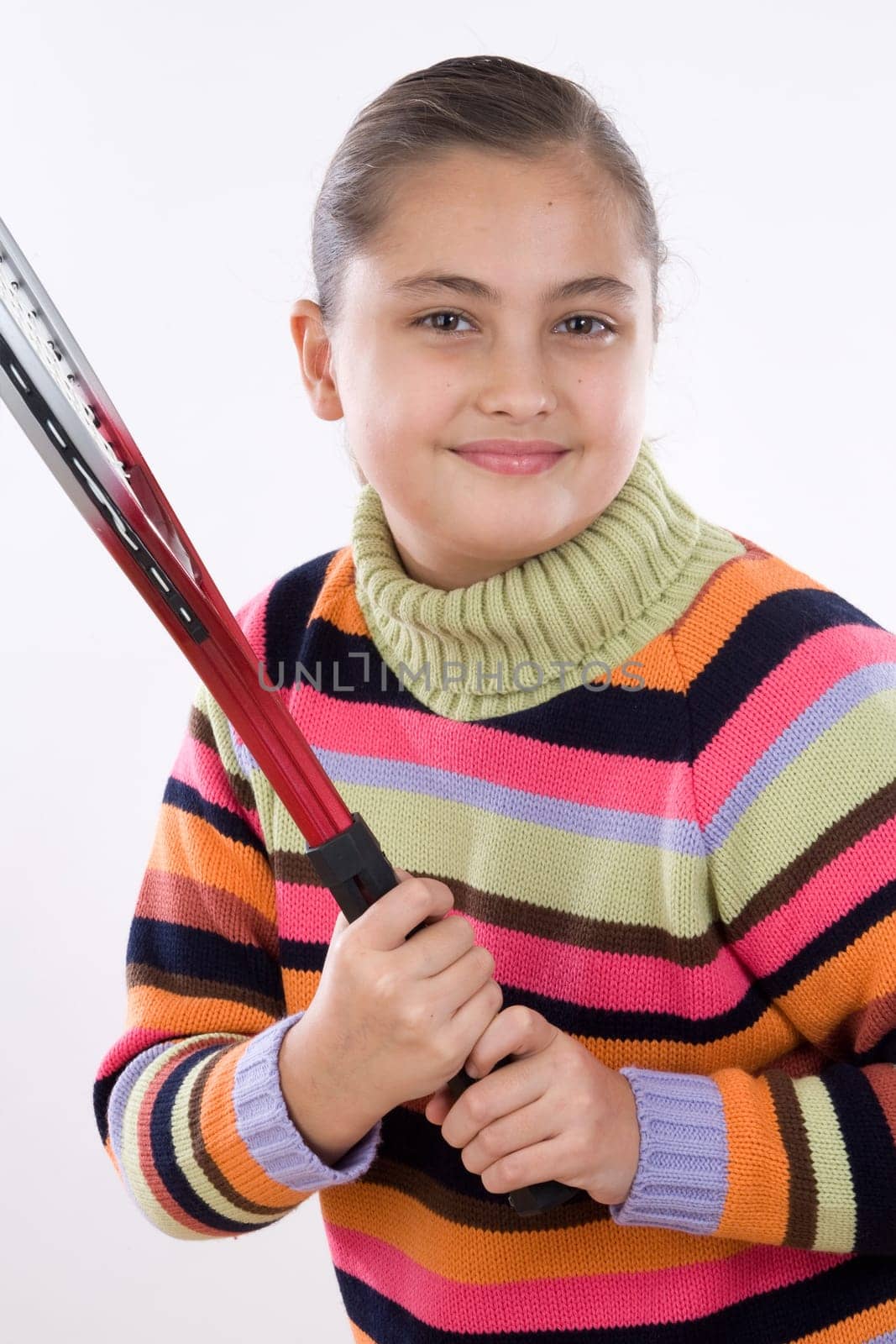 Adorable girl with racket of tennis