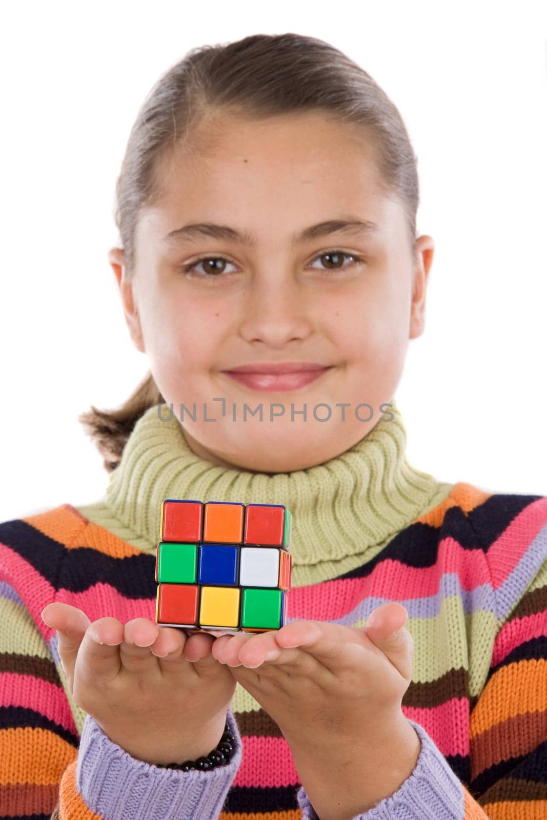 Little girl playing with a colorfull cub