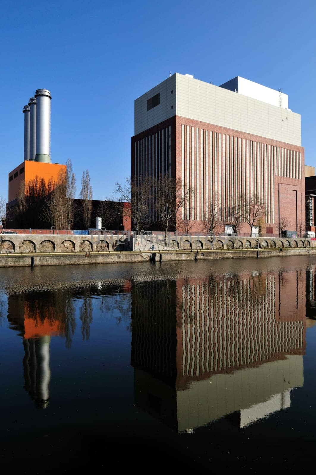 Power plant in front of a blue sky