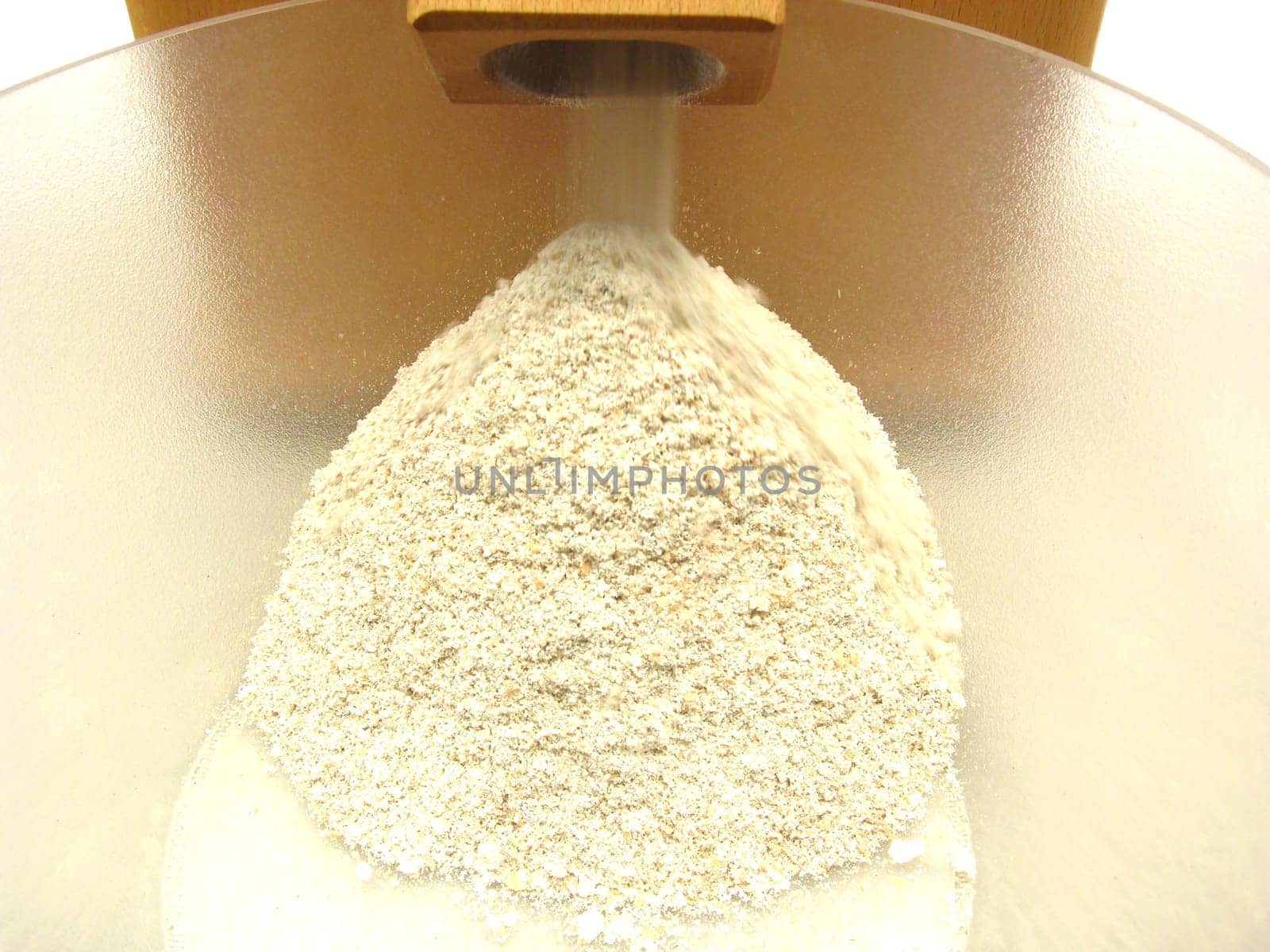 Watching the work of a flour mill