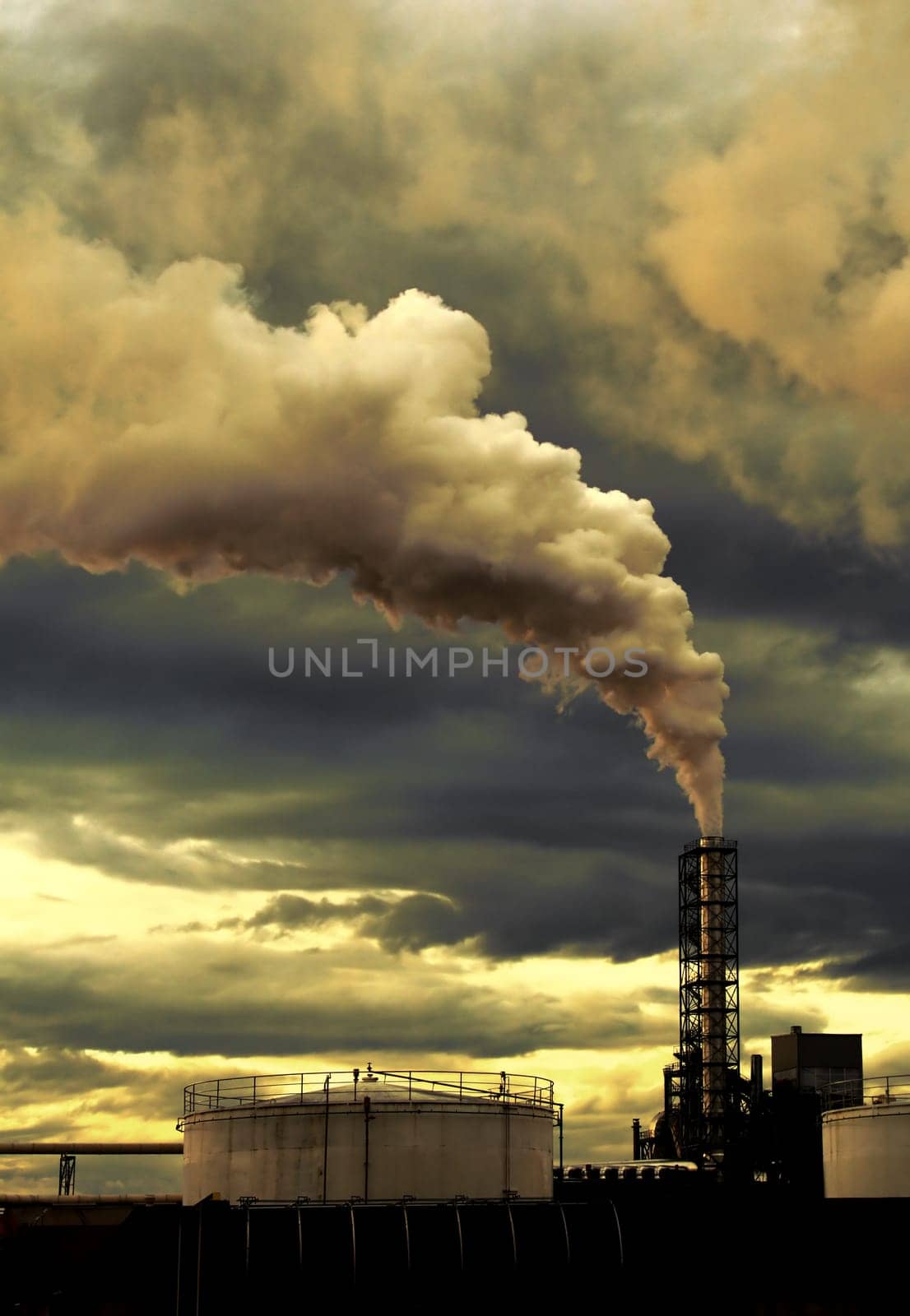 Thick smoke coming out of factory chimne