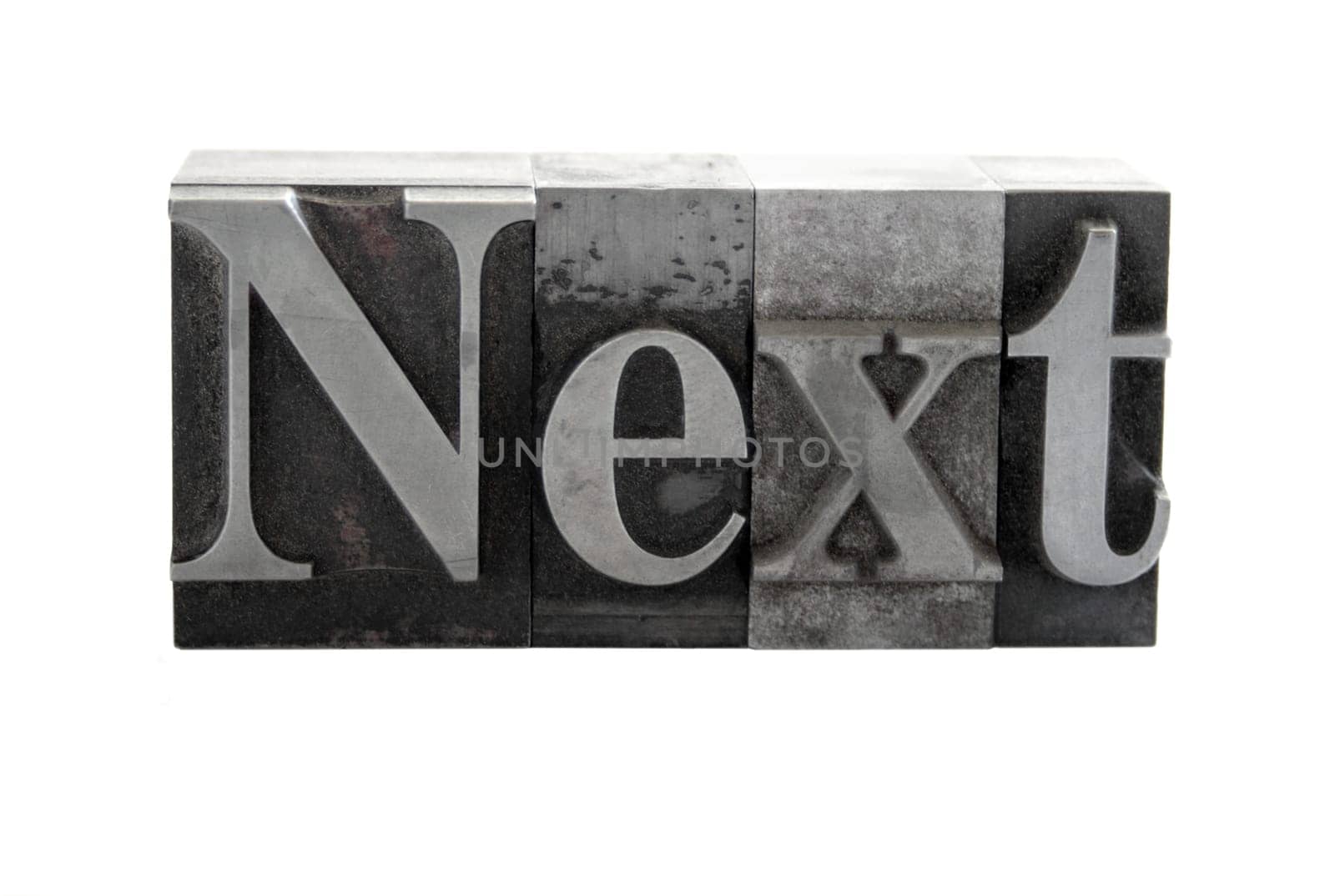 next in old metal type