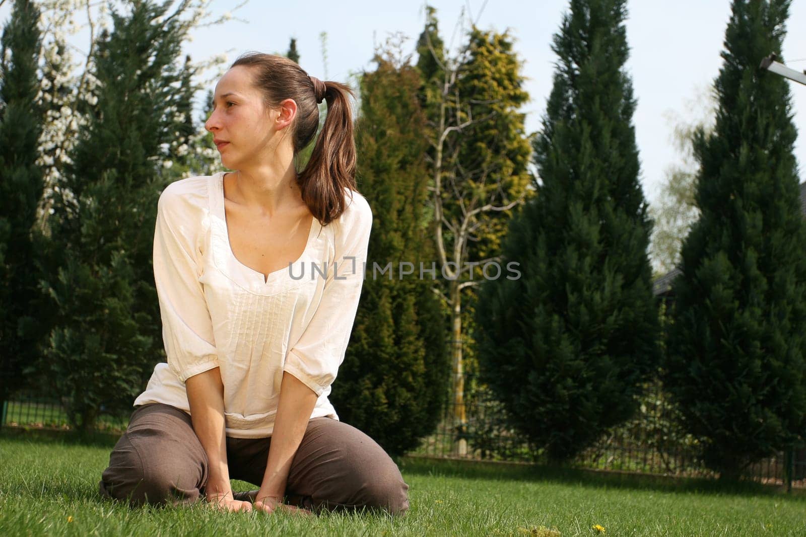 Woman sitting in the garden