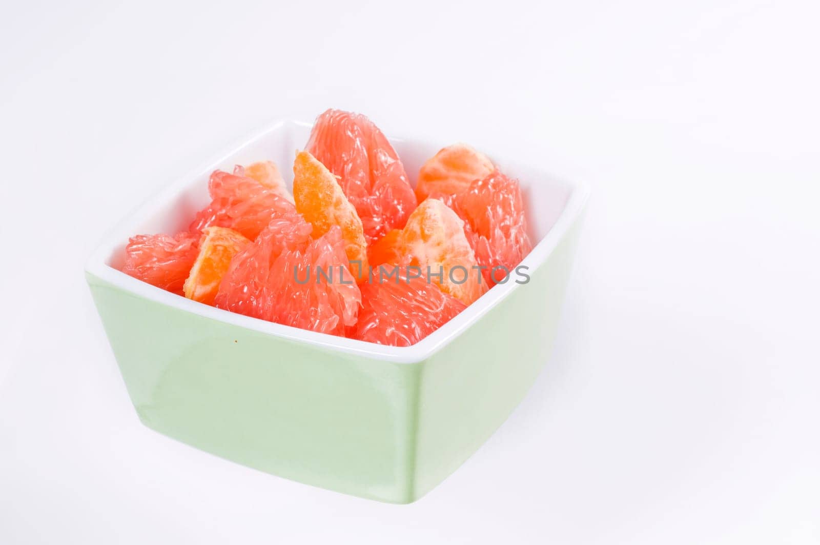 Fruit salad in green bowl