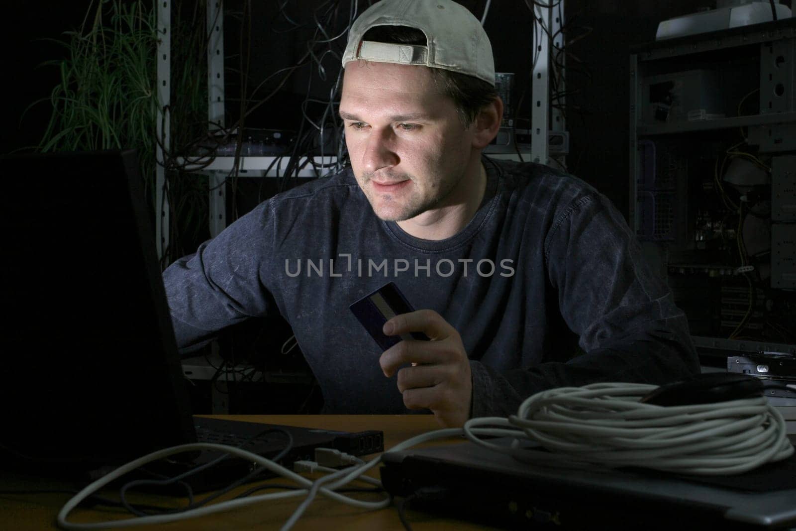 Computer hacker with credit card