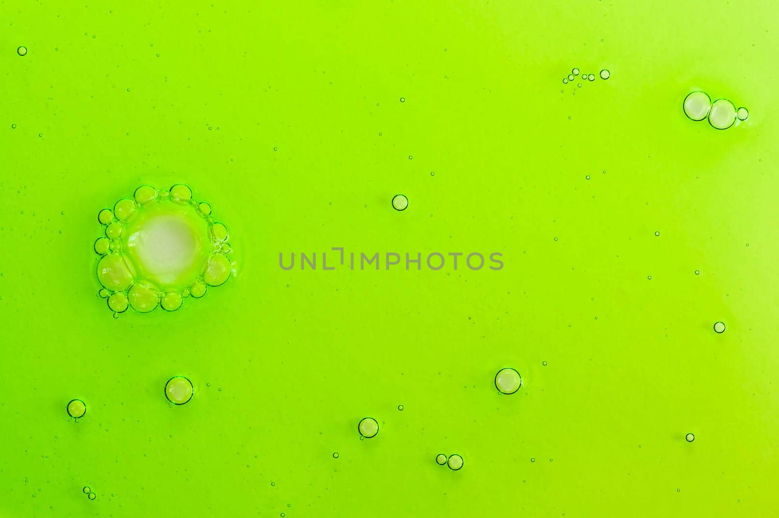 Abstract background with green liquid
