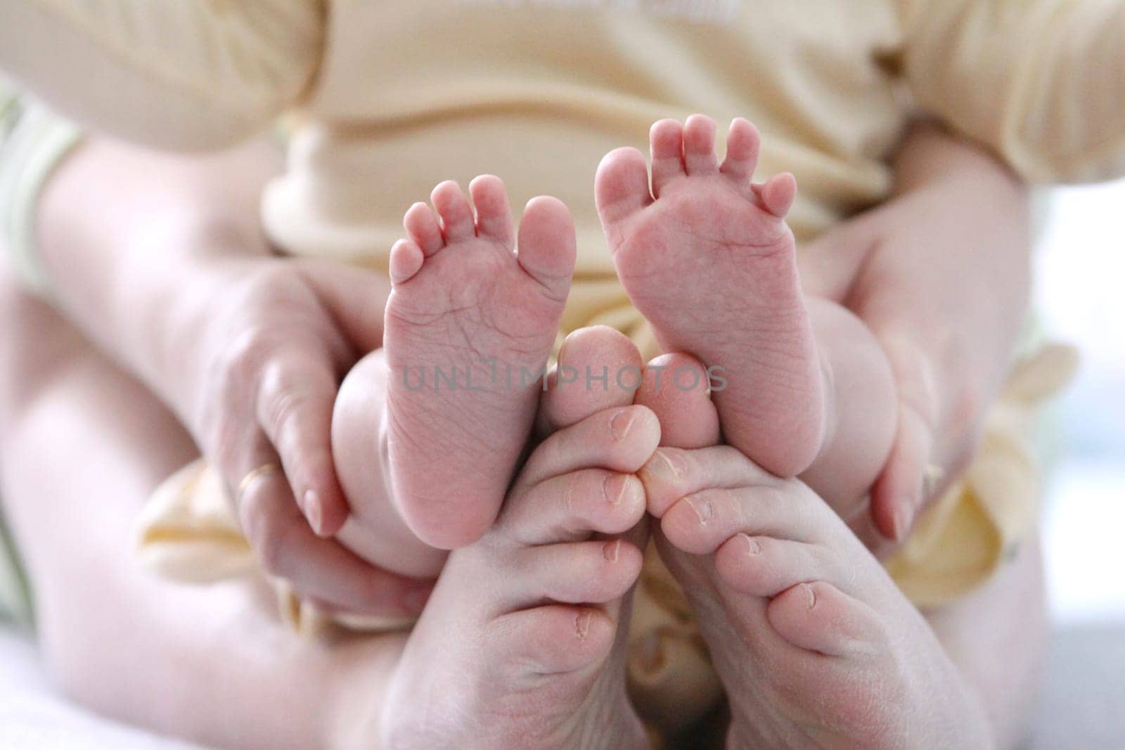 small childrens and adult mother foot