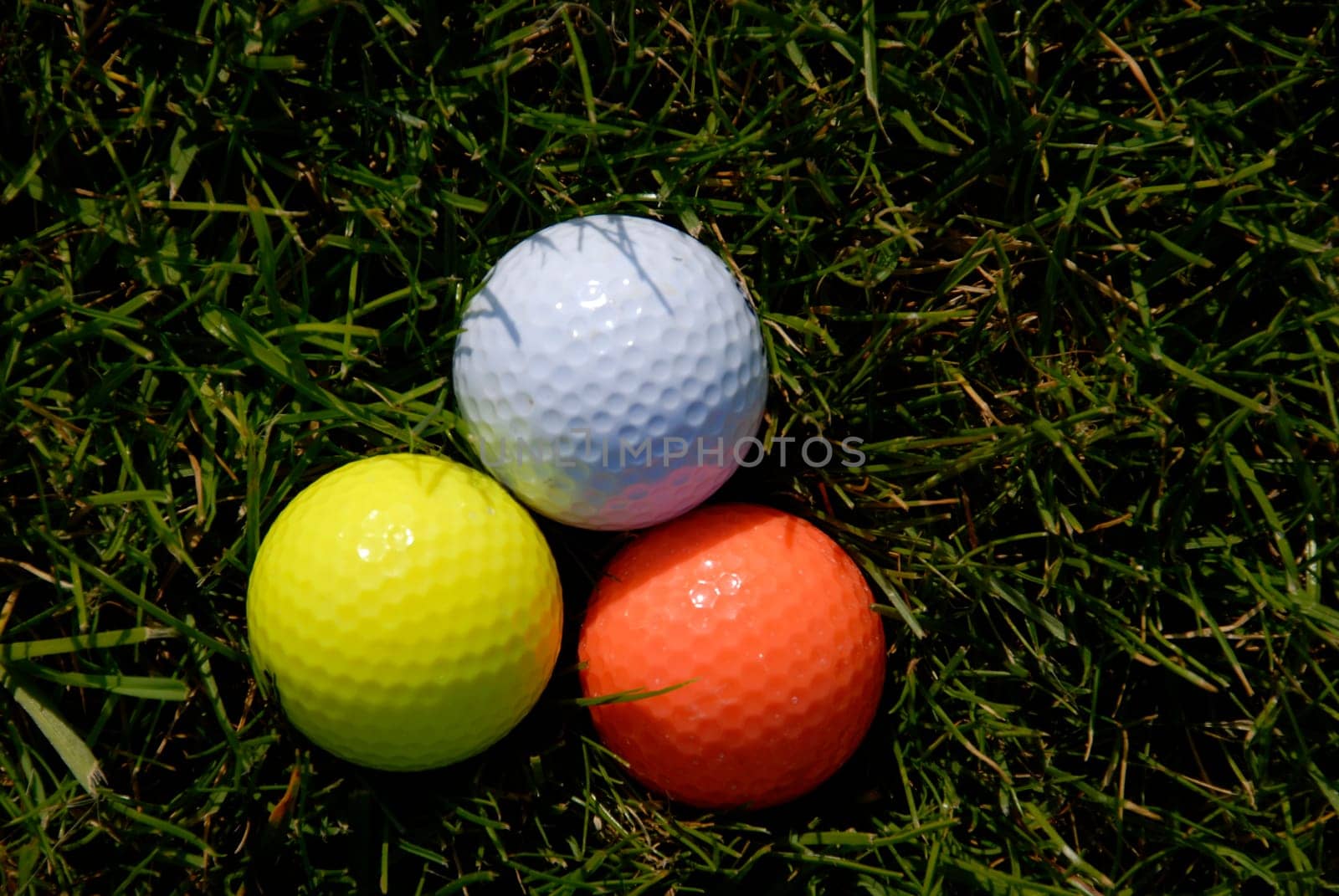 3 golf balls