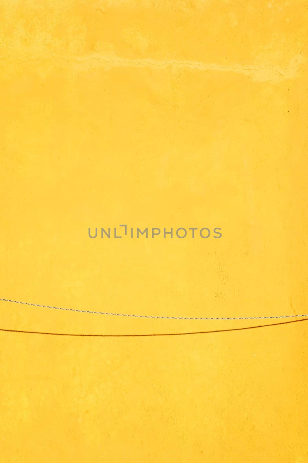 Yellow wall and Clothes line