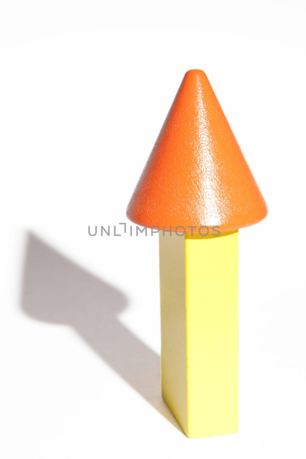 Yellow and orange arrow on white