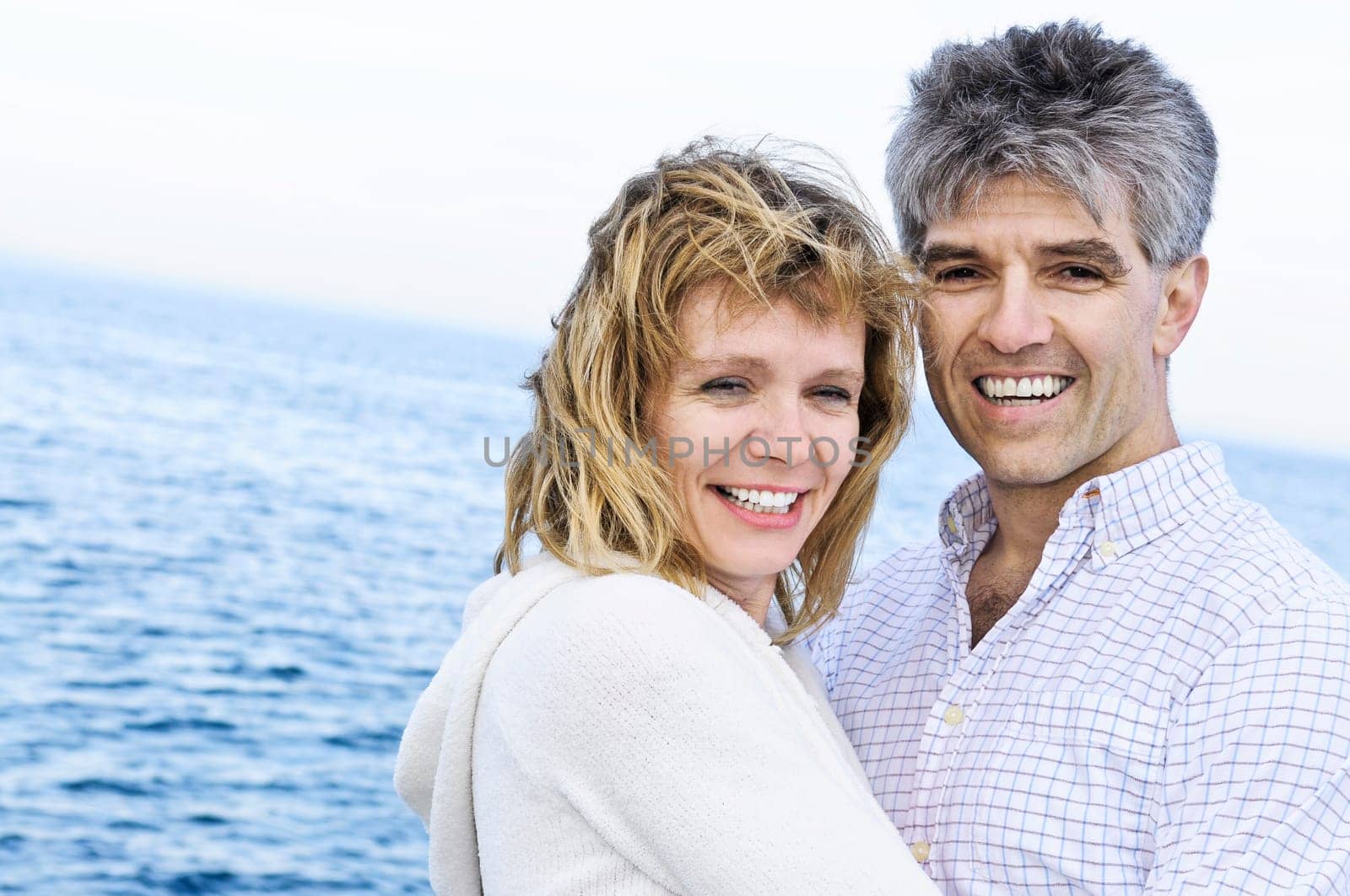 Mature romantic couple at seashore