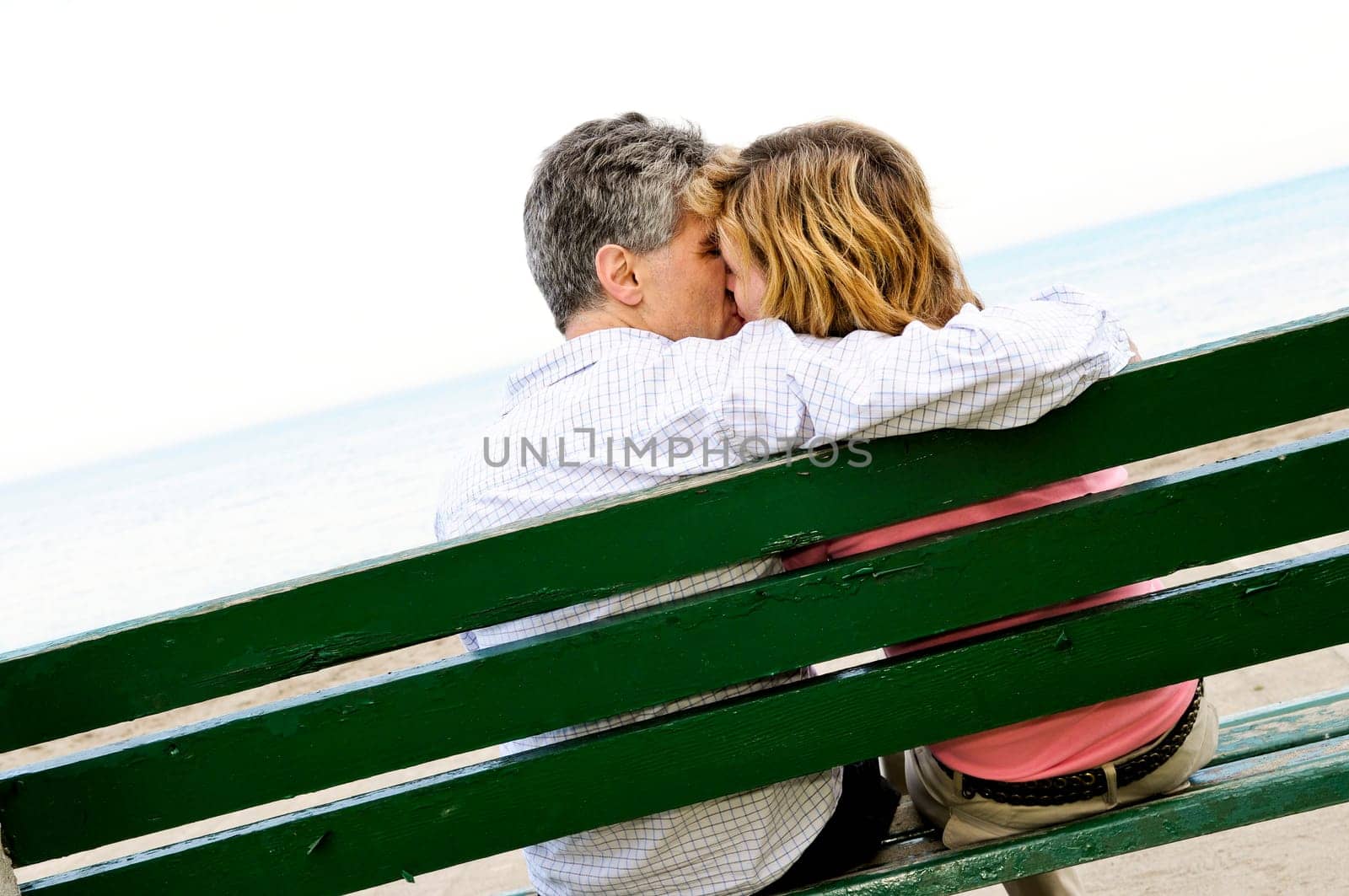 Mature romantic couple on a bench