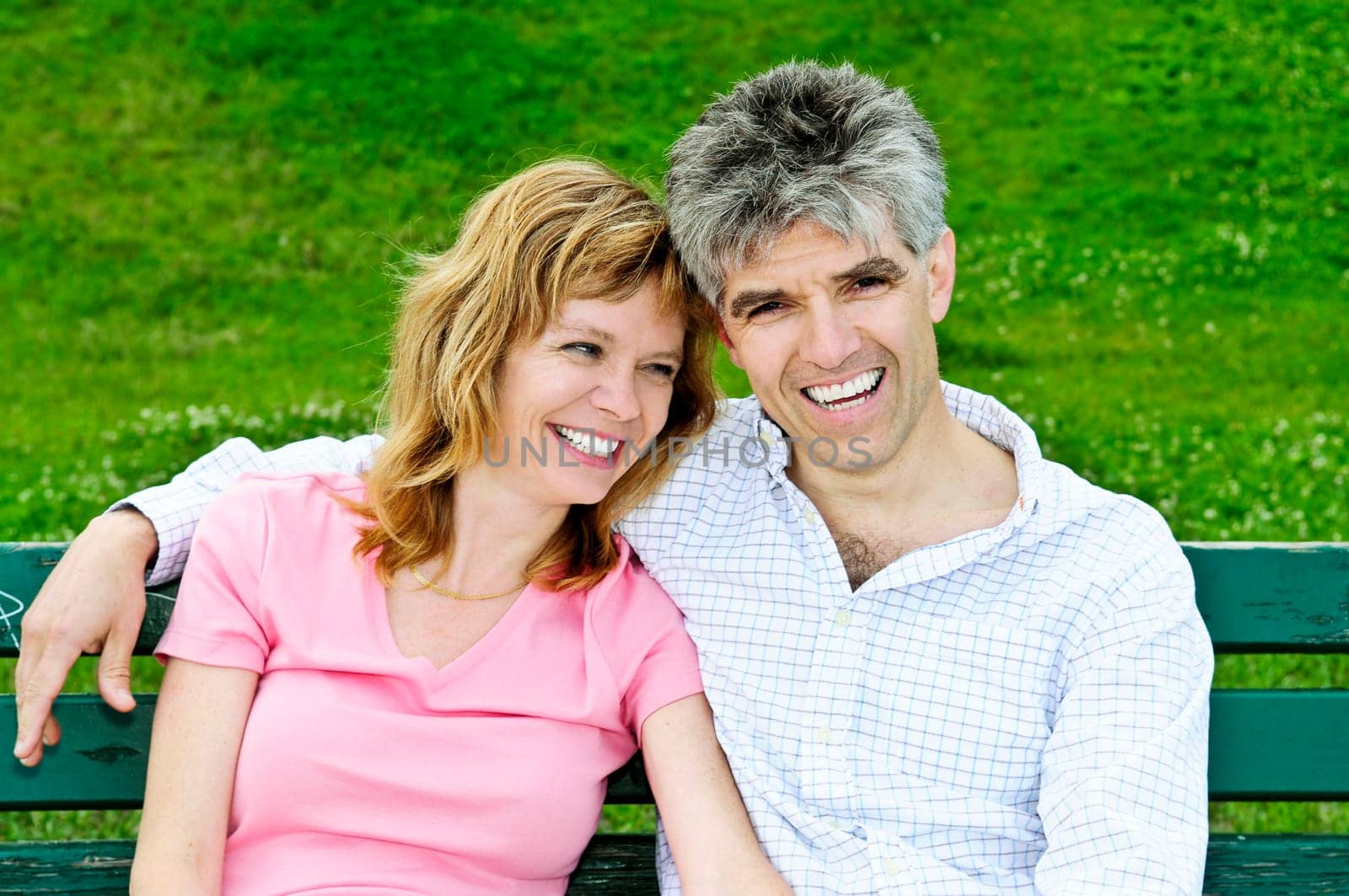 Mature romantic couple on a bench
