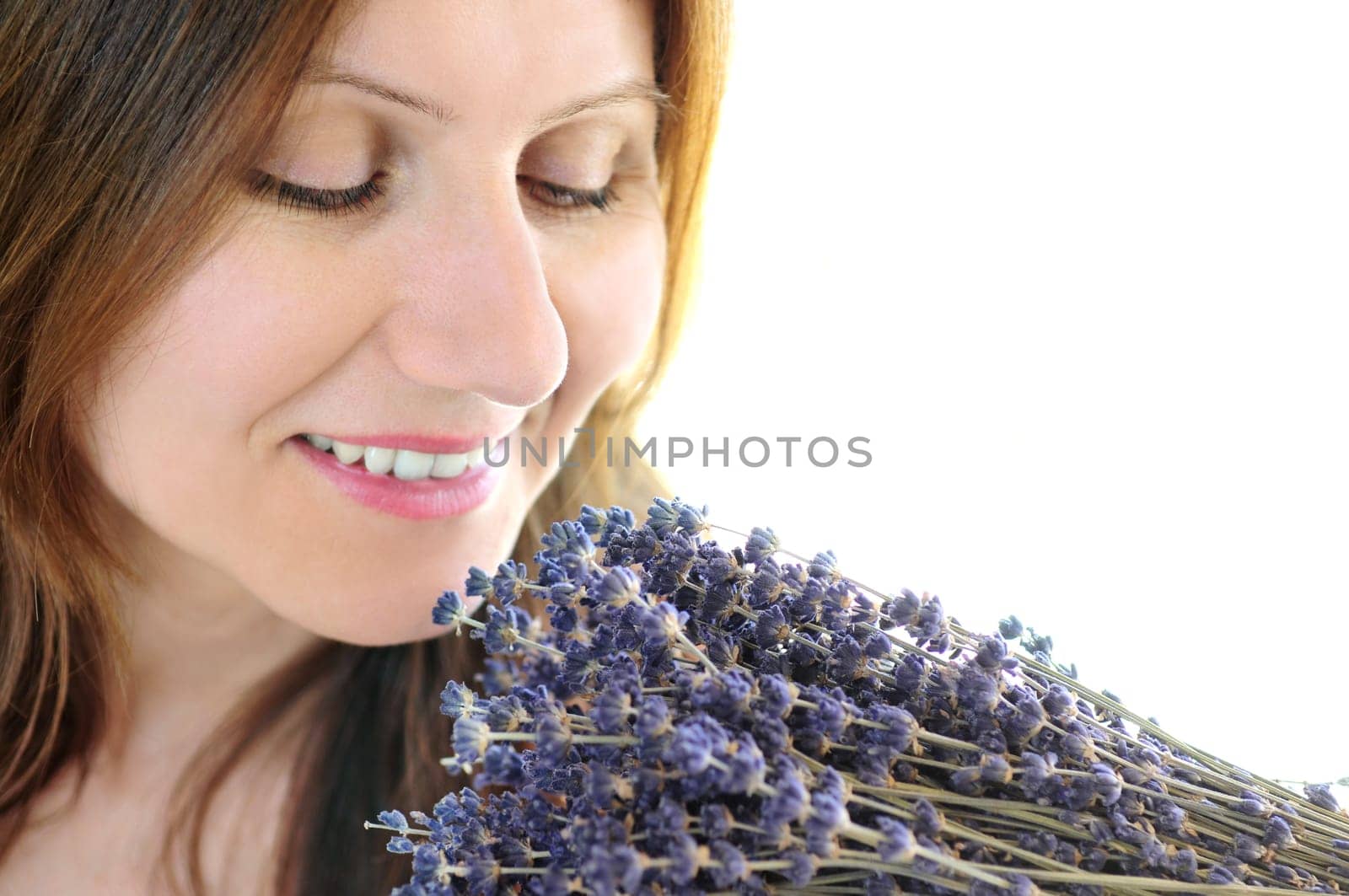 Woman smelling lavender