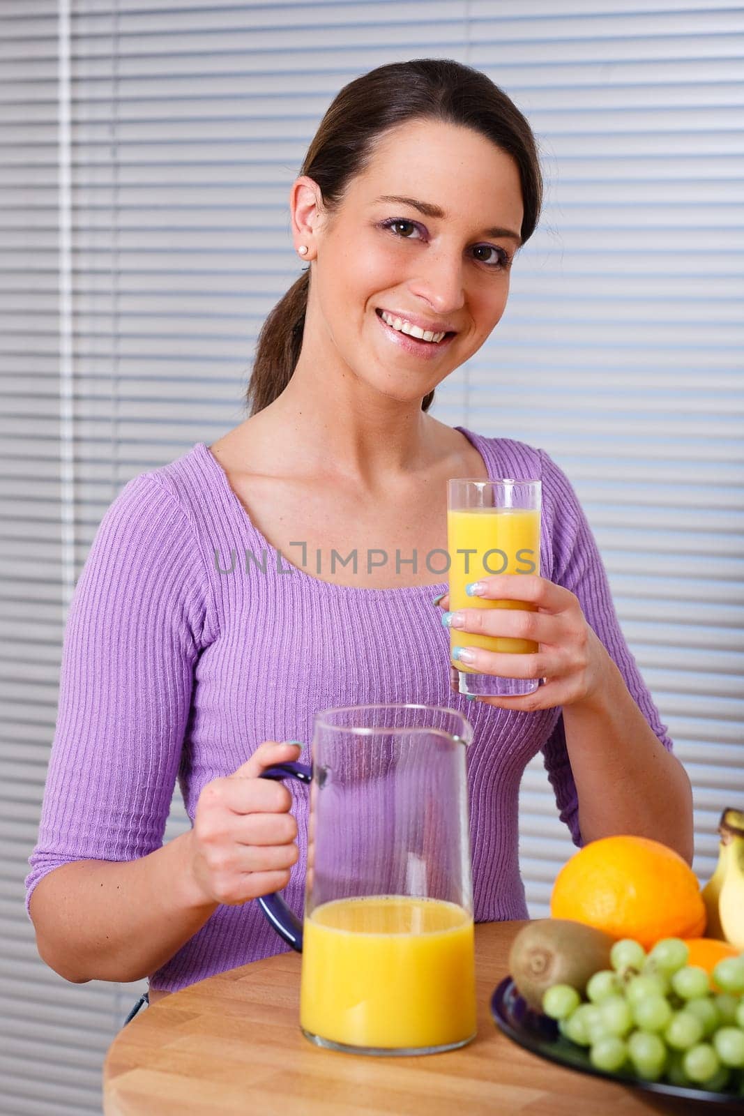 Woman wants to drink orange juice