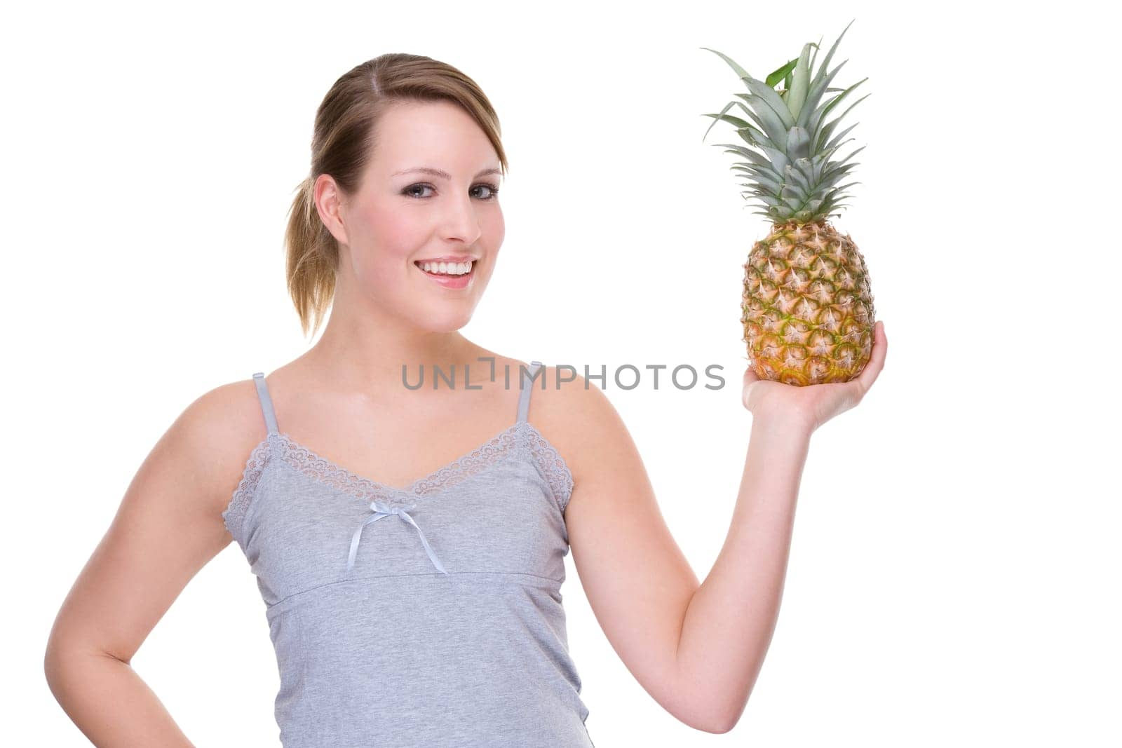 Young woman with a pineapple