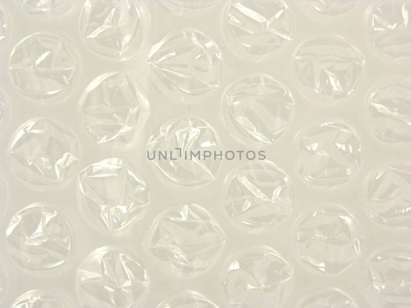 packaging film with burst air bubbles