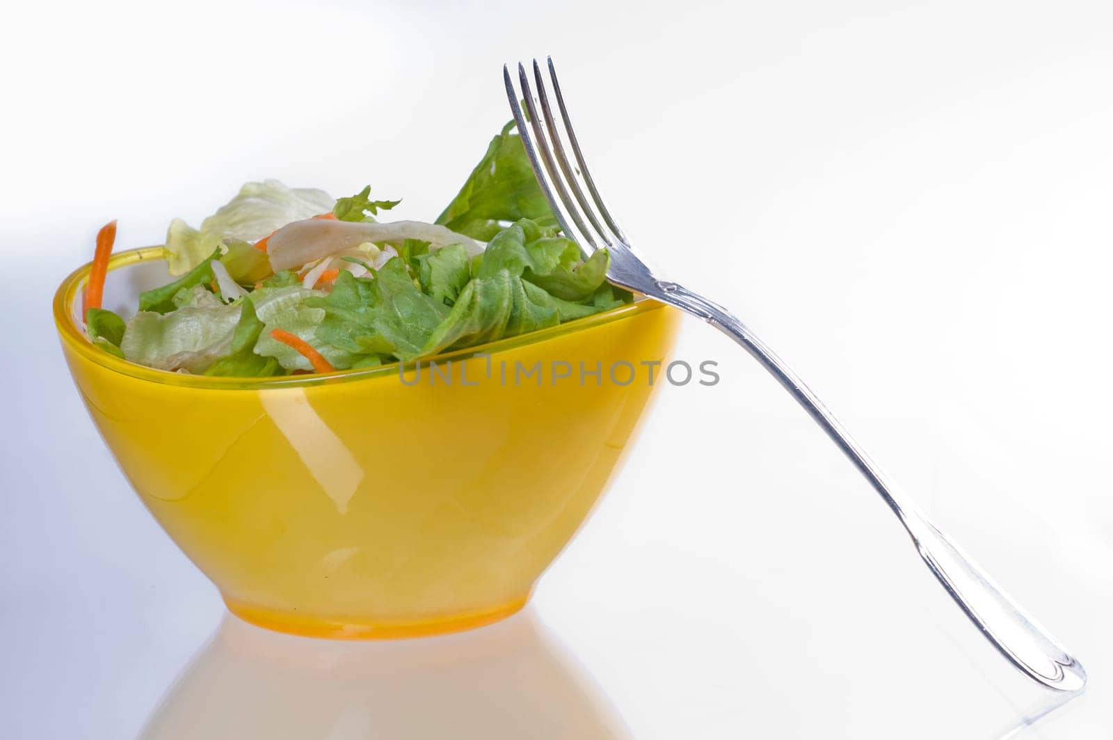 Mixed salad in yellow peel